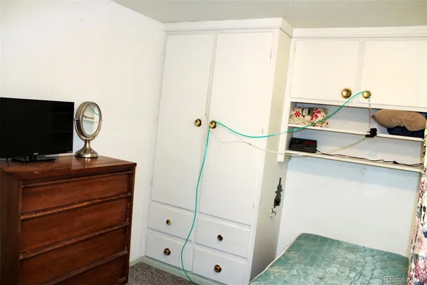 a bathroom with a toilet and a sink