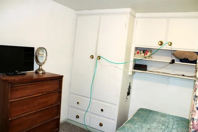 a bathroom with a toilet and a sink