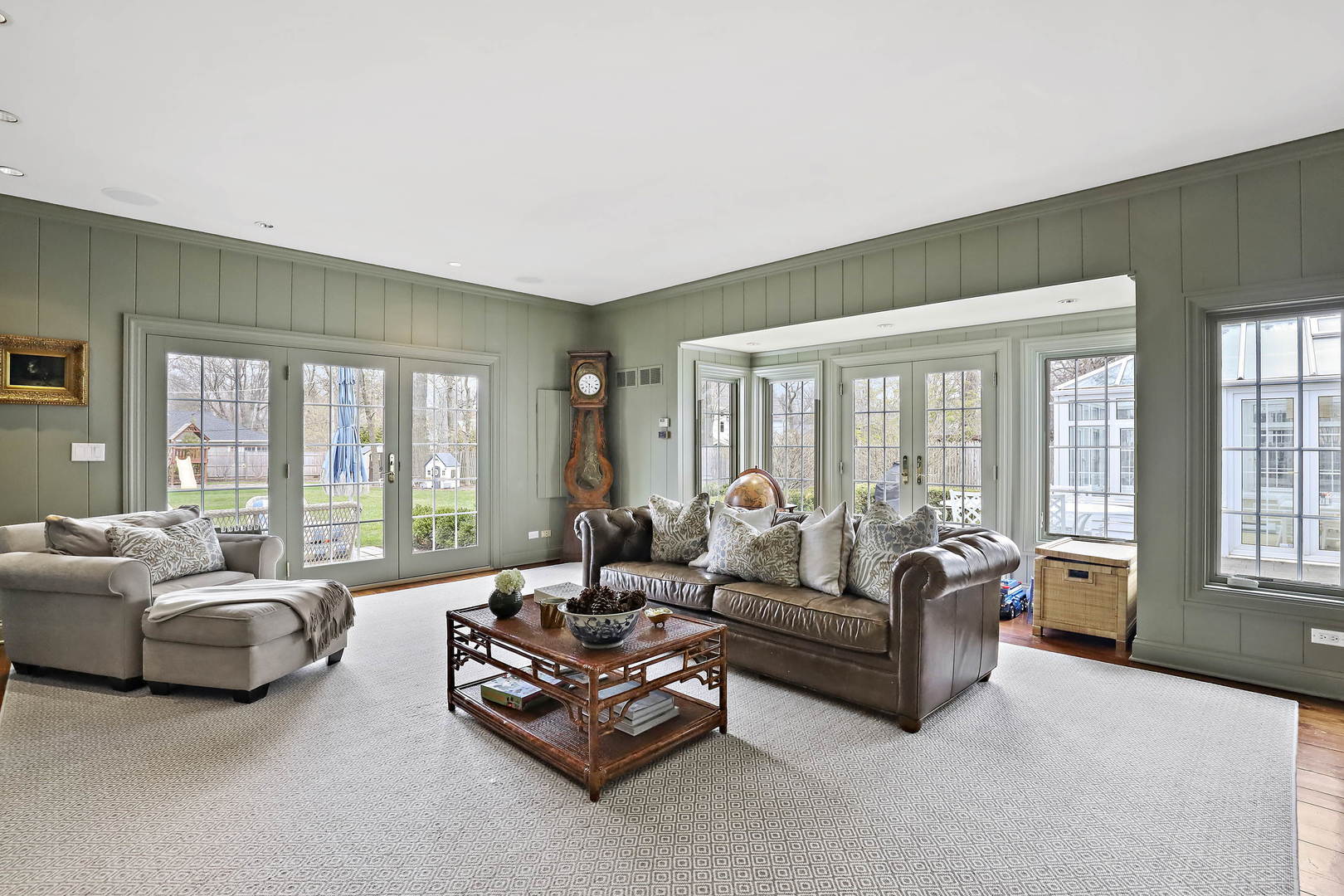 138 East Sheridan Road Lake Bluff, IL 60044 - Photo 14 of 39 a living room with furniture and large windows