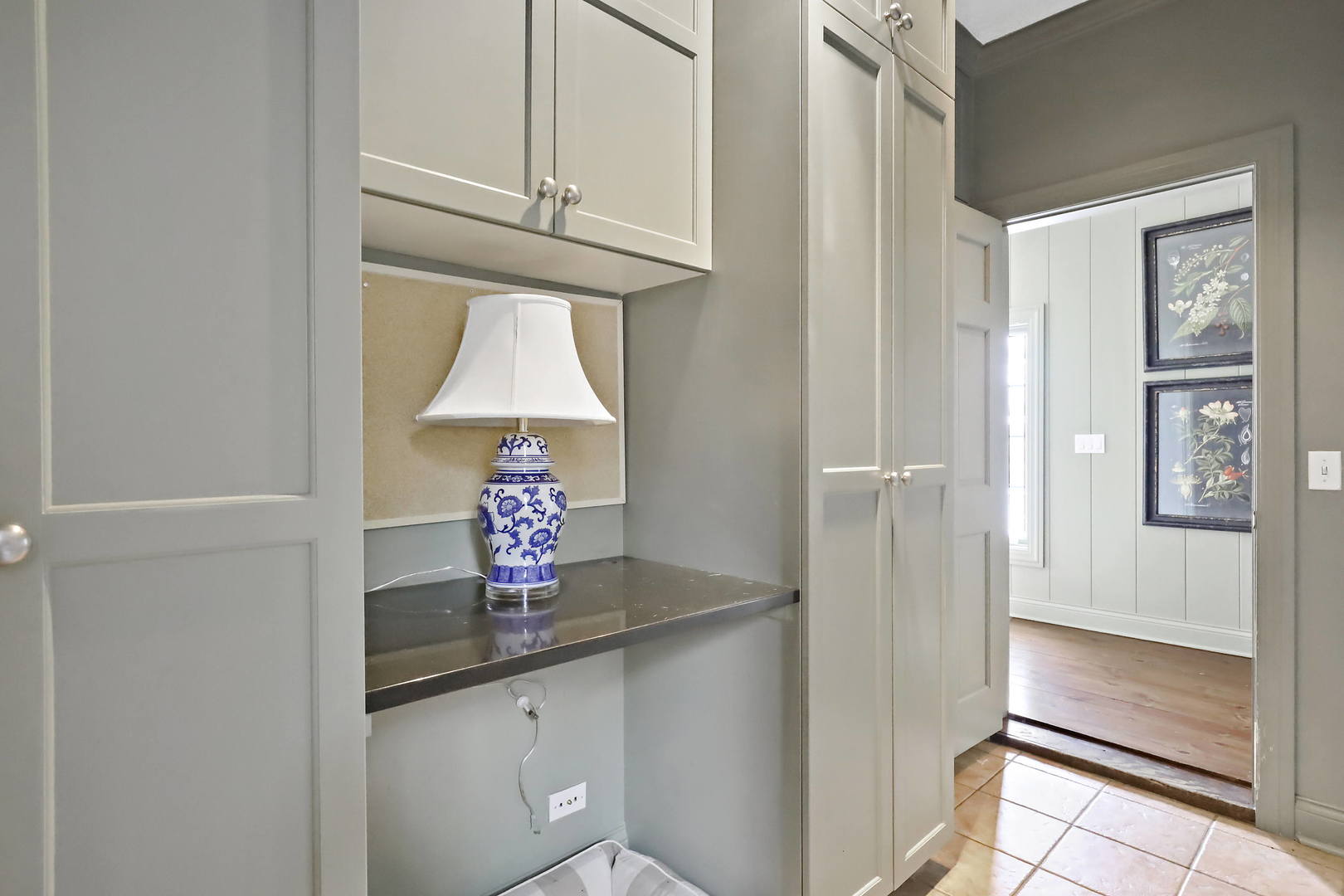 138 East Sheridan Road Lake Bluff, IL 60044 - Photo 18 of 39 a dining table chair next to a window in a kitchen
