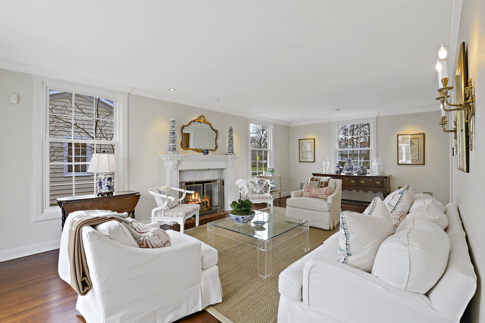 138 East Sheridan Road Lake Bluff, IL 60044 - Photo 2 of 39 a living room with furniture fireplace and a window