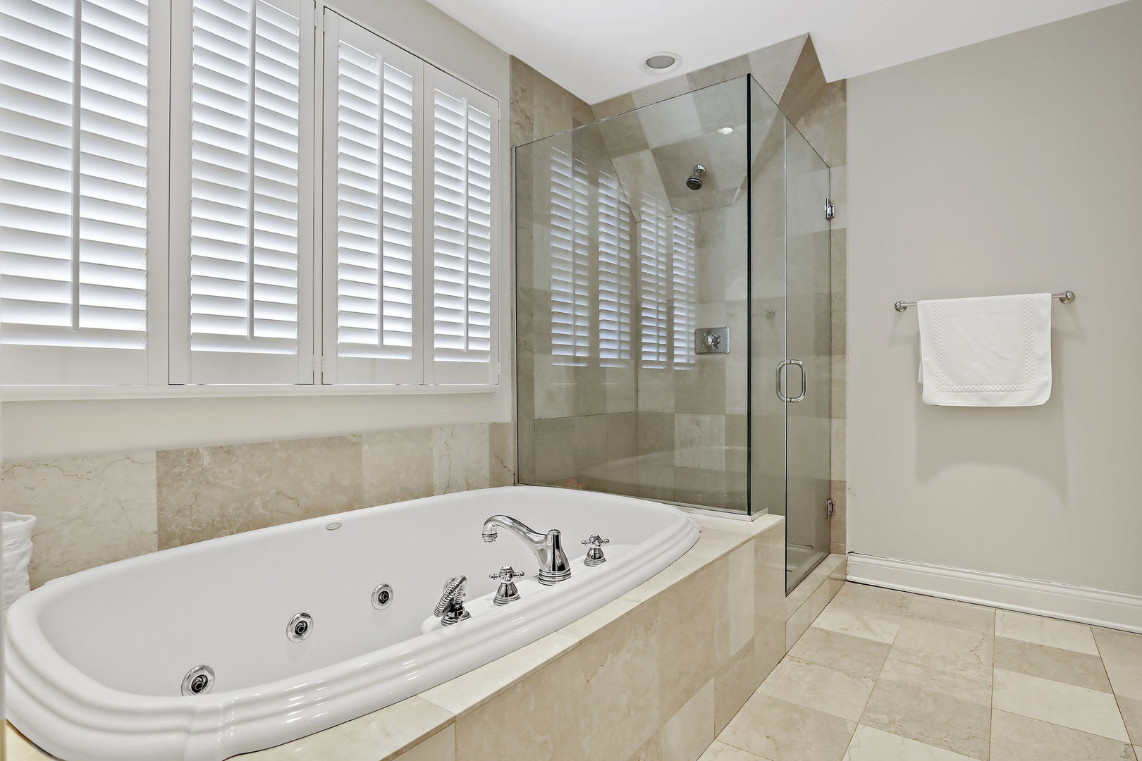 138 East Sheridan Road Lake Bluff, IL 60044 - Photo 25 of 39 a bathroom with a bathtub and a shower