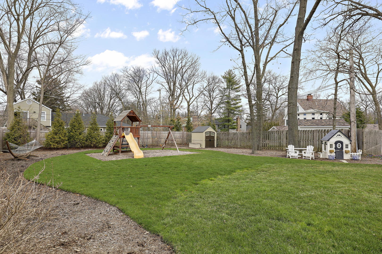 138 East Sheridan Road Lake Bluff, IL 60044 - Photo 32 of 39 a view of a park with swings and slides