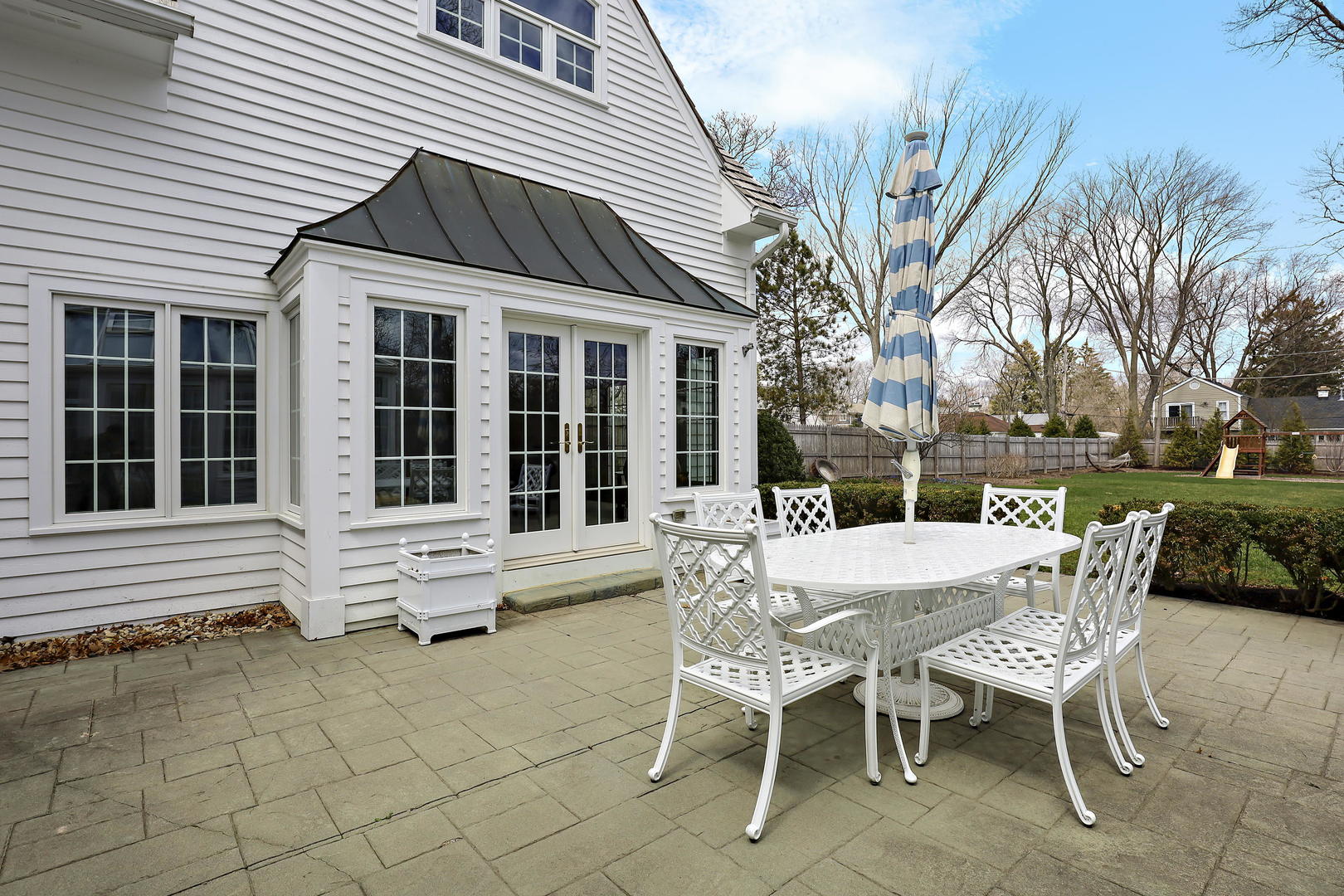 138 East Sheridan Road Lake Bluff, IL 60044 - Photo 33 of 39 a view of a house with backyard and sitting area