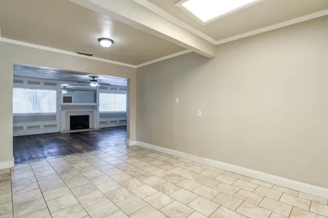 a view of an empty room and window