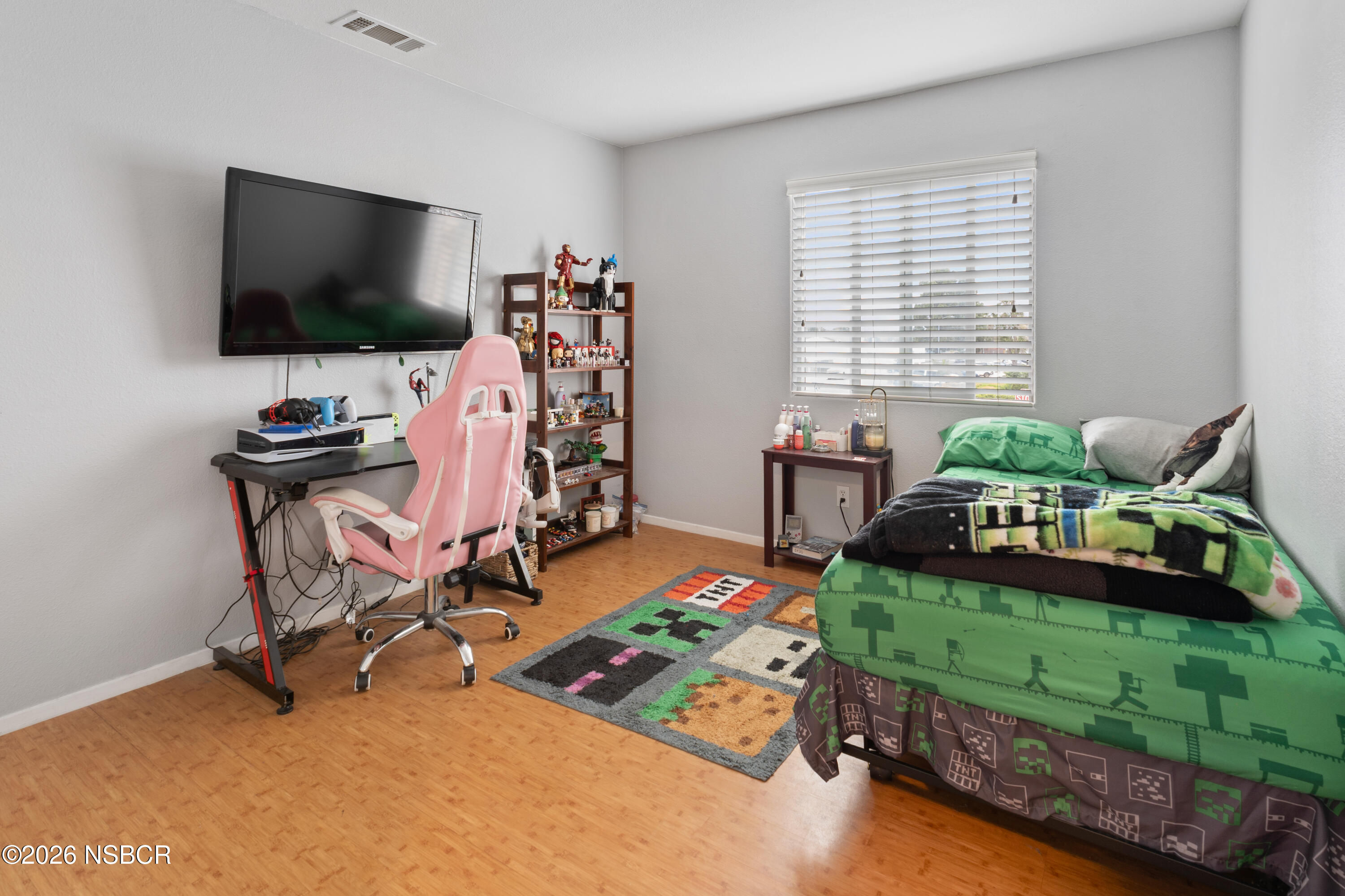 240 Quail Circle Lompoc, CA 93436 - Photo 14 of 19 a living room with furniture and a flat screen tv