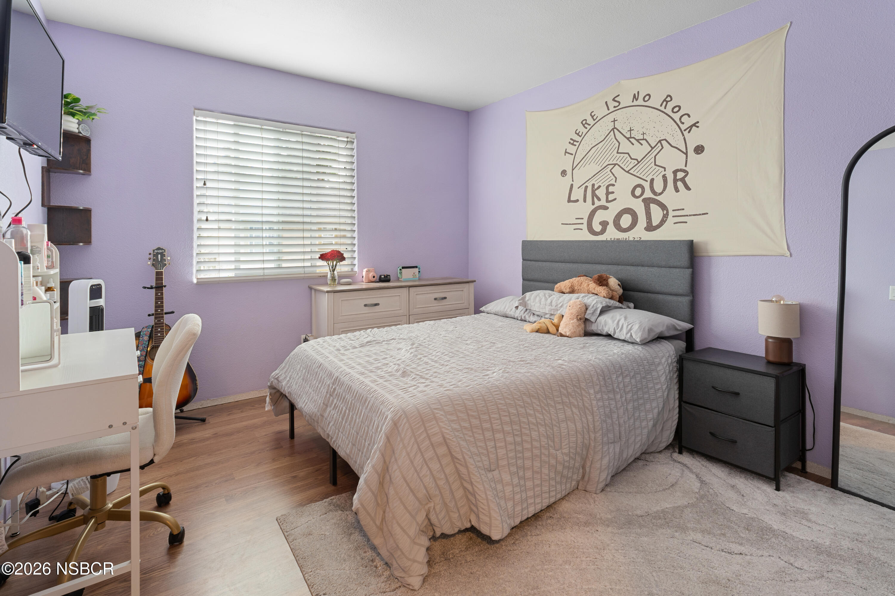 240 Quail Circle Lompoc, CA 93436 - Photo 15 of 19 a bedroom with a bed and a table in it