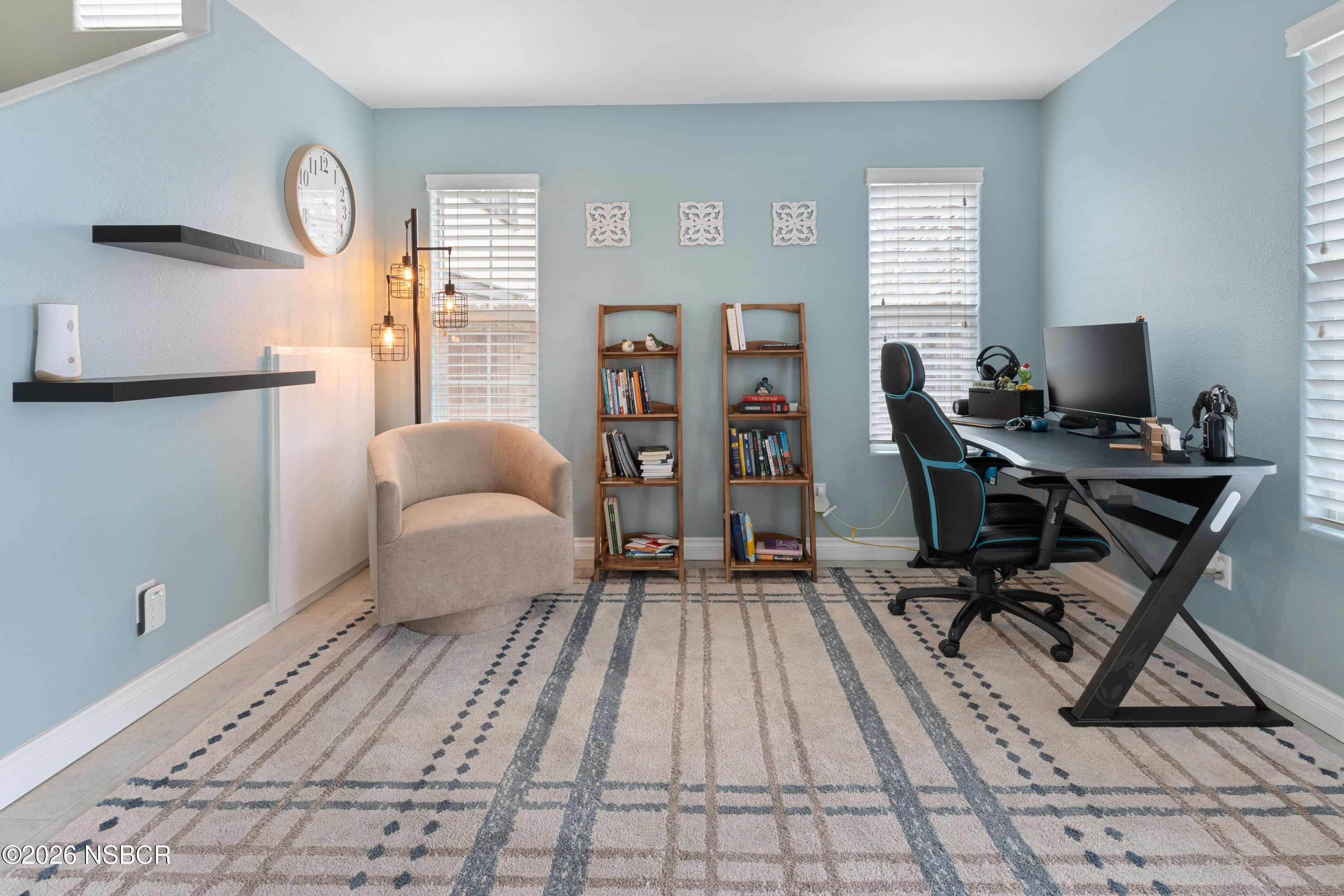 240 Quail Circle Lompoc, CA 93436 - Photo 3 of 19 a workspace with lounge chair and a window