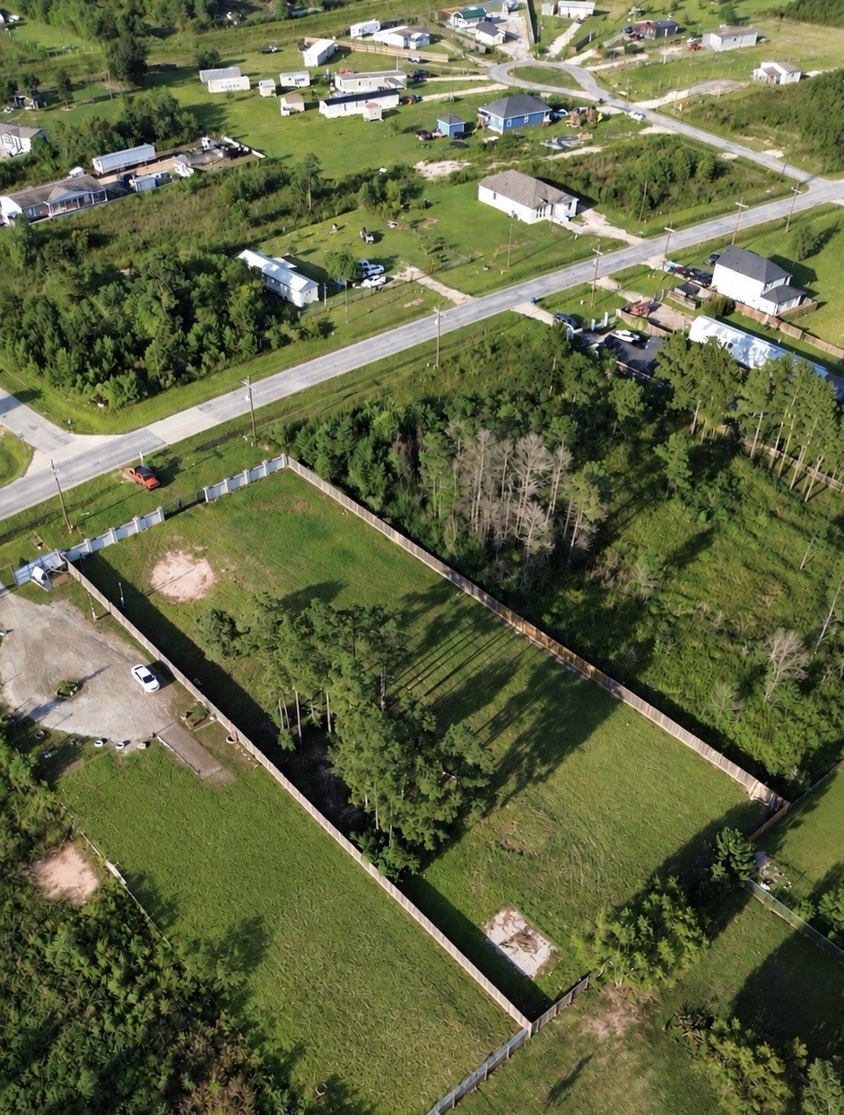 1229 County Road 5100 Road Cleveland, TX 77327 - Photo 10 of 16 Bring your RV, boat, large trucks, or horses and enjoy the space this property has to offer.