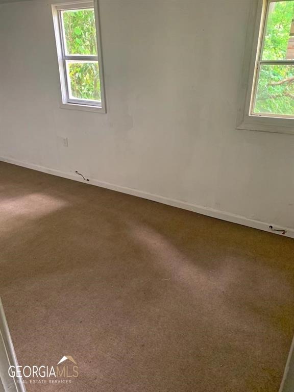 116 Edwards Street Bremen, GA 30110 - Photo 14 of 33 an empty room with a window