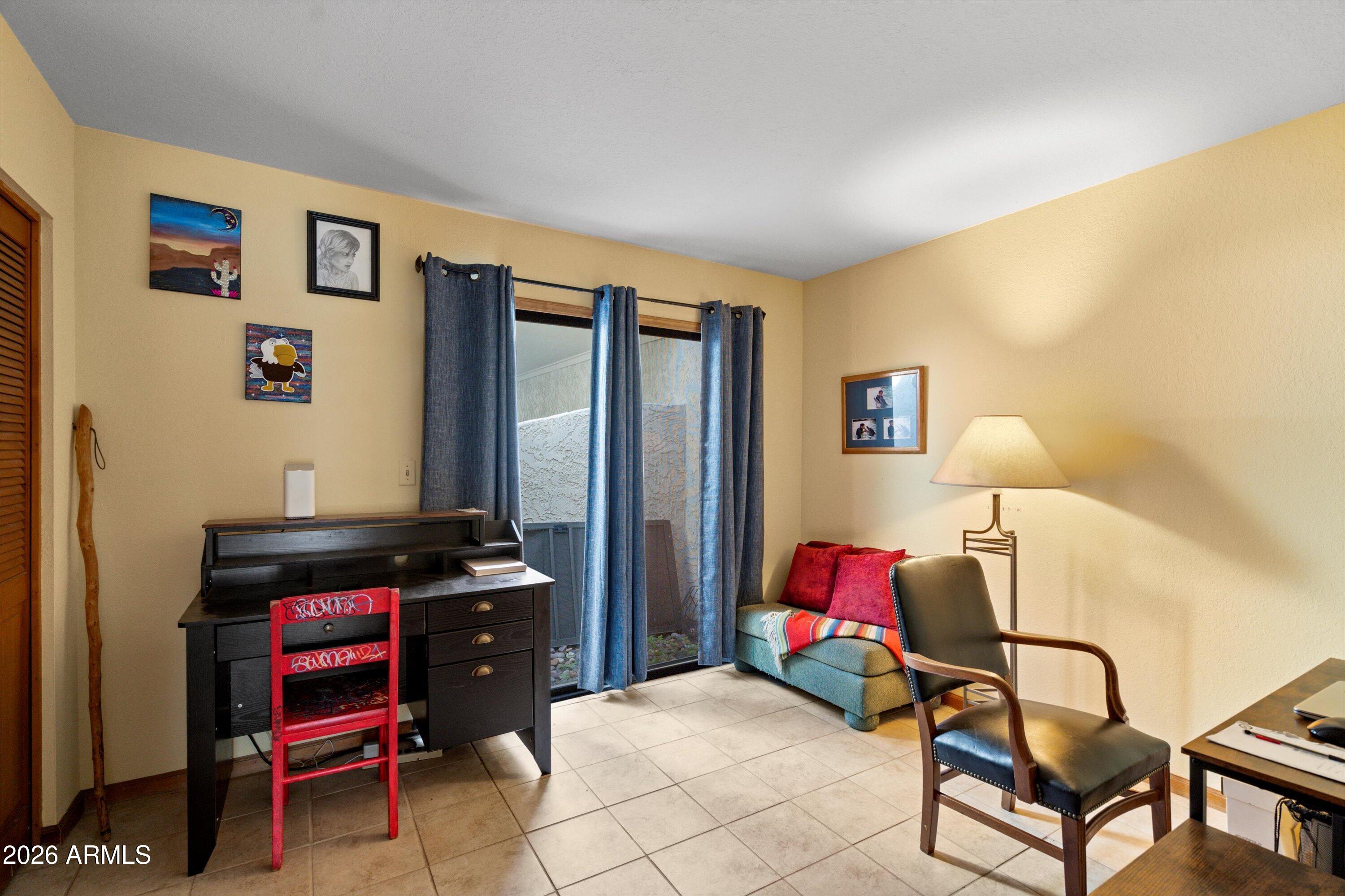 1301 West Rio Salado Parkway, Unit 22 Mesa, AZ 85201 - Photo 15 of 21 a bedroom with a bed and a closet