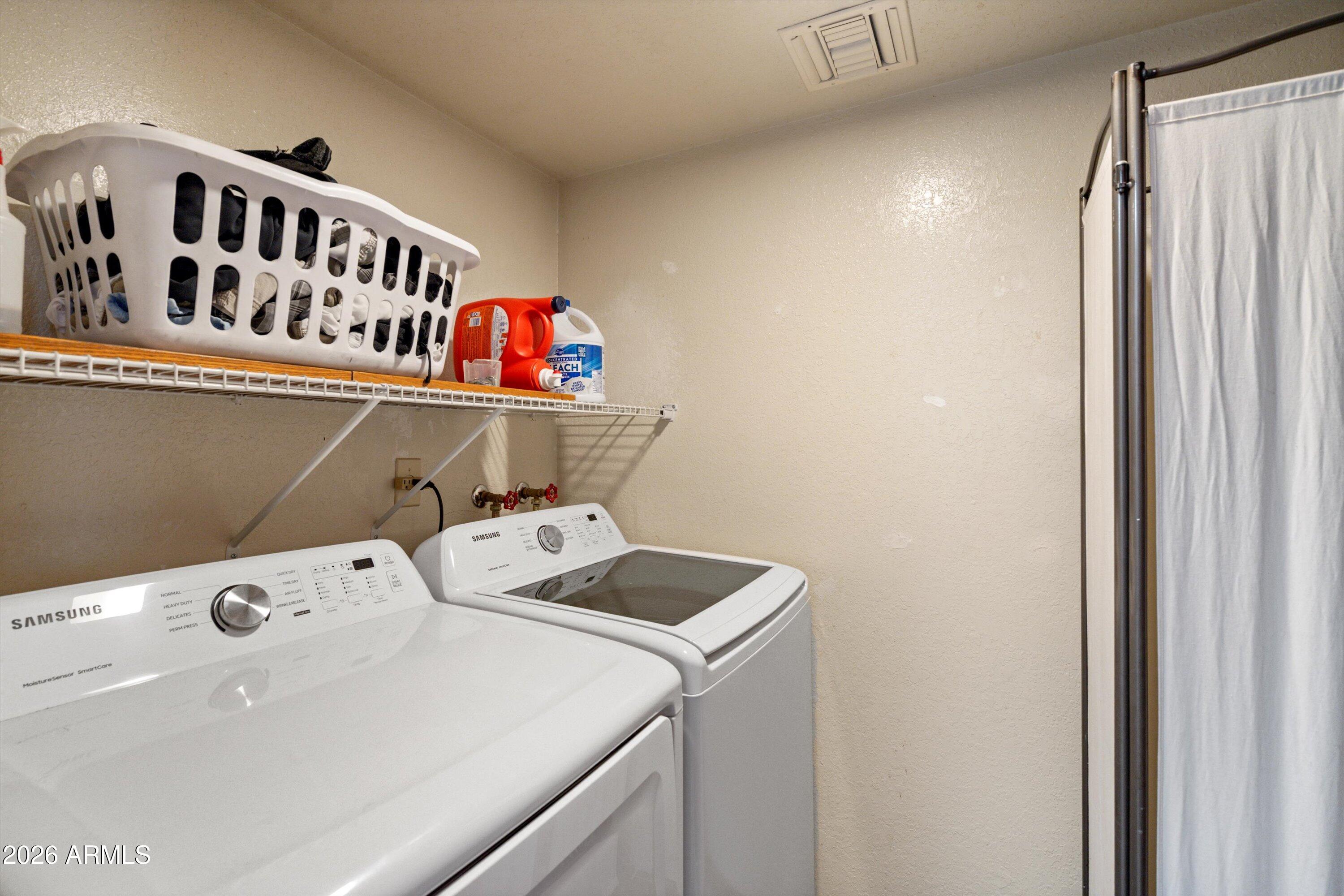 1301 West Rio Salado Parkway, Unit 22 Mesa, AZ 85201 - Photo 17 of 21 a utility room with dryer and washer