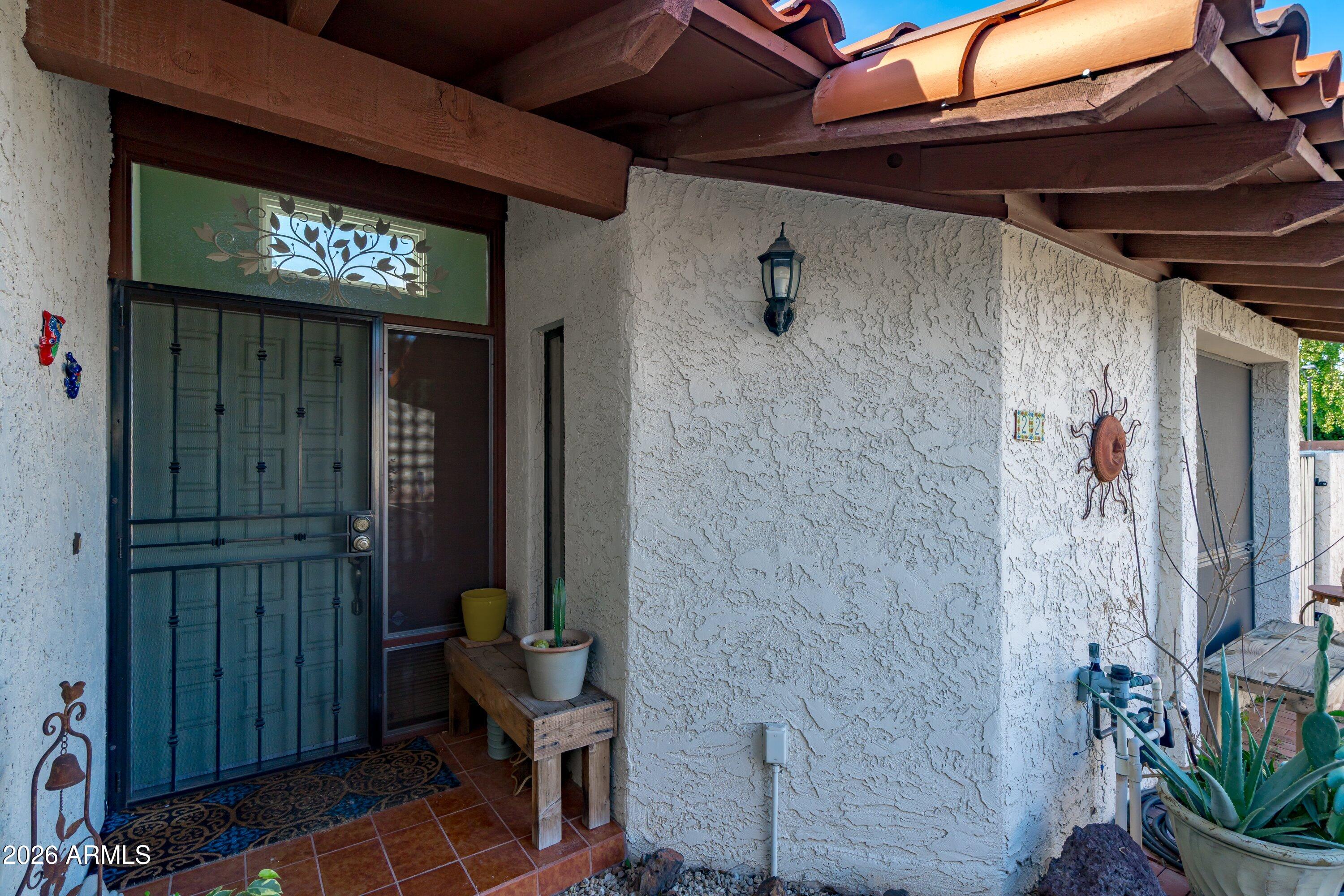 1301 West Rio Salado Parkway, Unit 22 Mesa, AZ 85201 - Photo 4 of 21 a view of a hallway with seating area