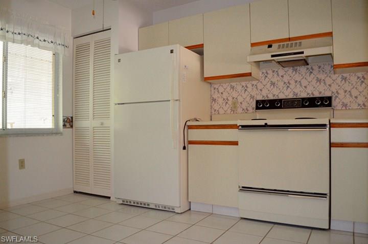 5675 Whitaker Road, Unit B204 Naples, FL 34112 - Photo 7 of 23 Gallery Image 7