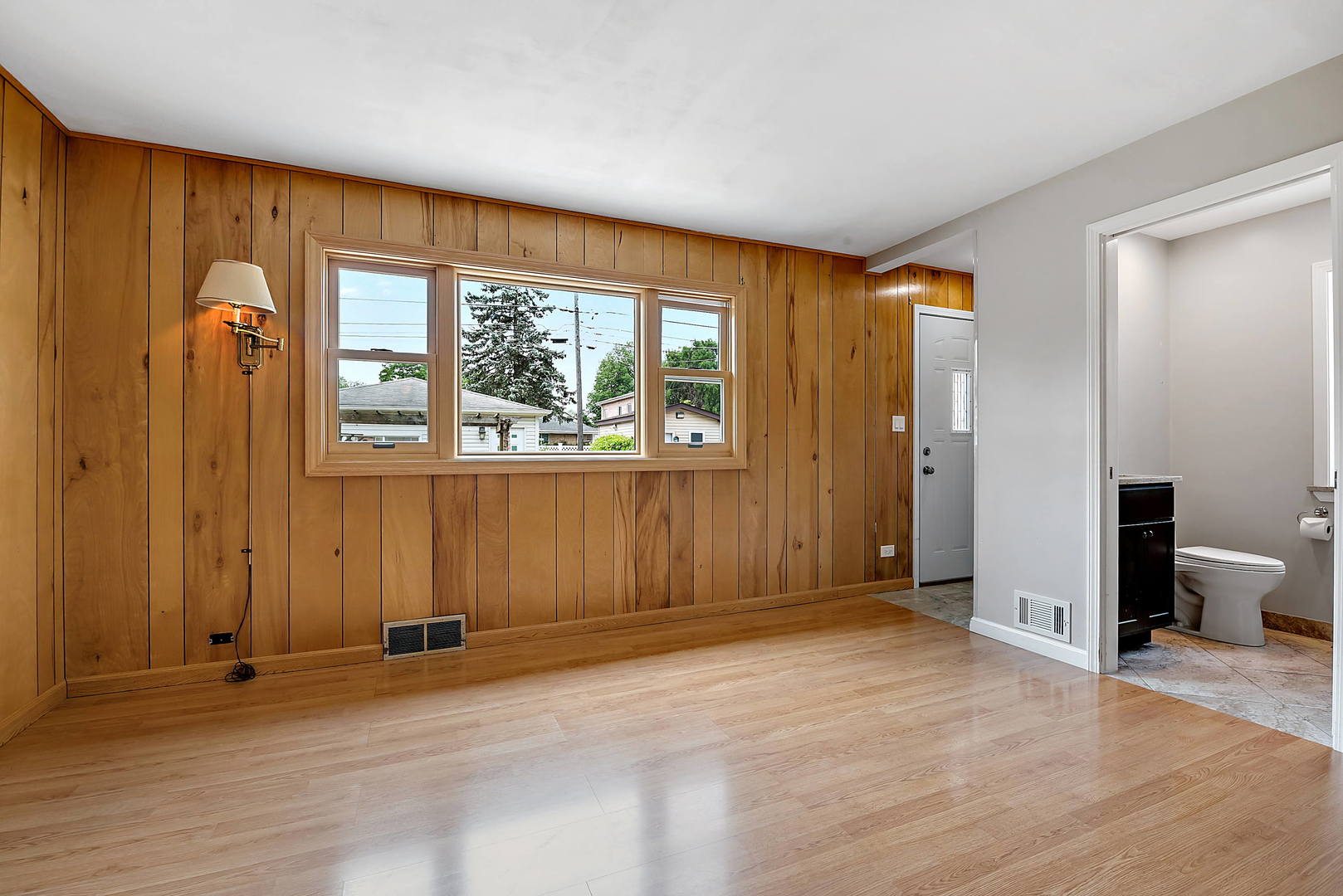 7438 Kenneth Avenue Skokie, IL 60076 - Photo 7 of 17 an empty room with windows and closet