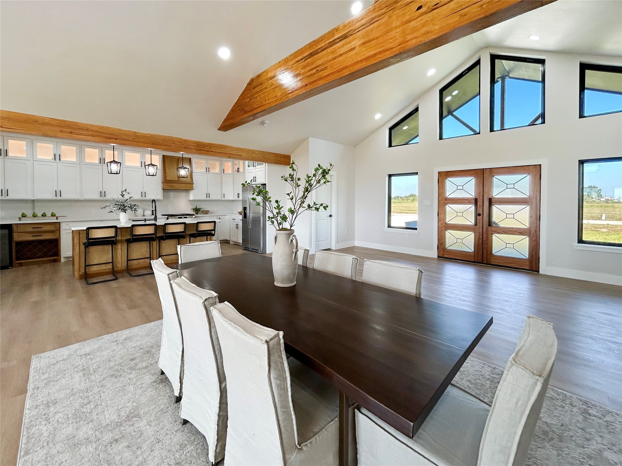 619 Chuckwagon Trail Angleton, TX 77515 - Photo 12 of 35 a dining room with wooden floor and breakfast area