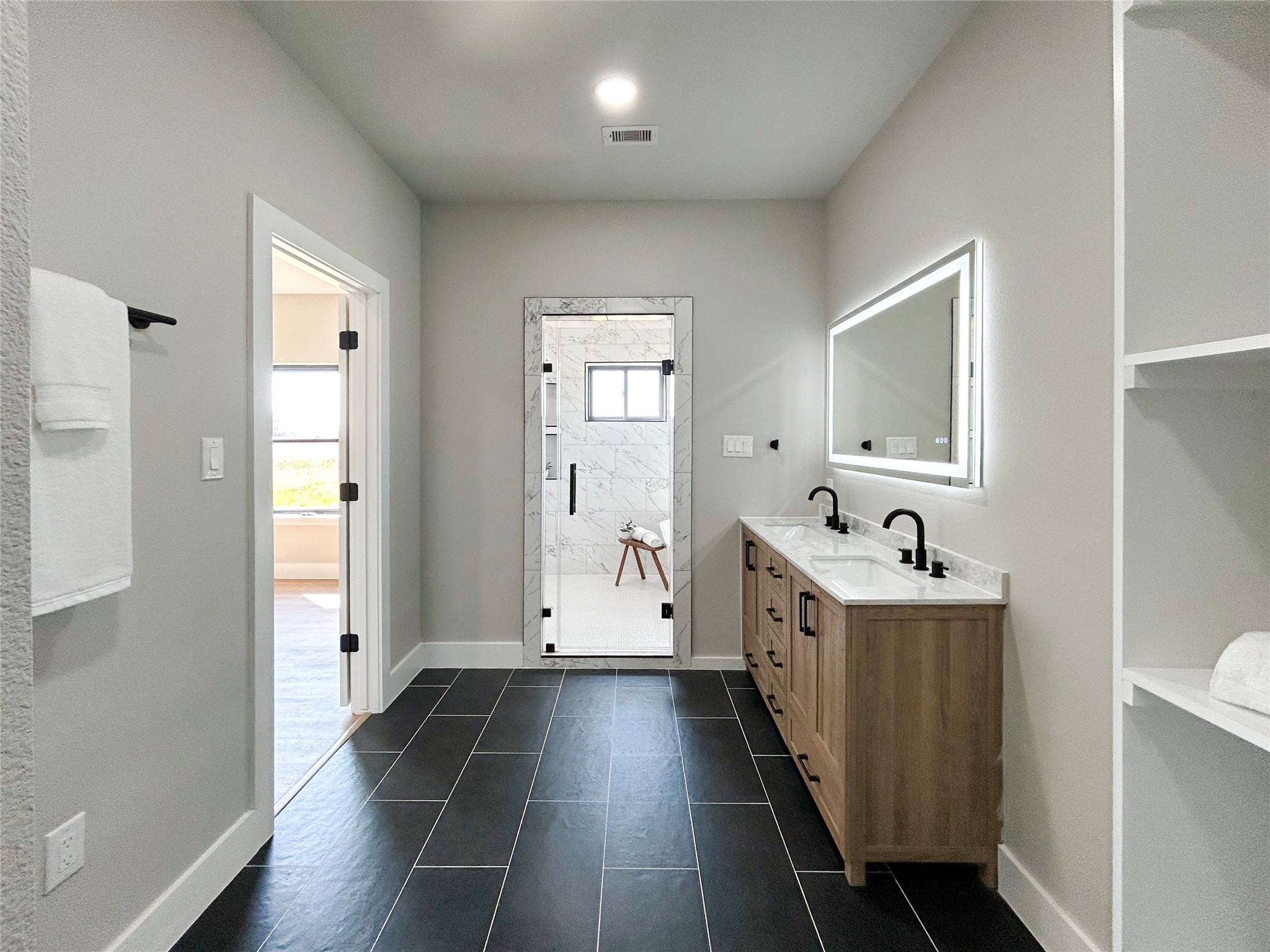 619 Chuckwagon Trail Angleton, TX 77515 - Photo 26 of 35 a bathroom with a sink and a mirror