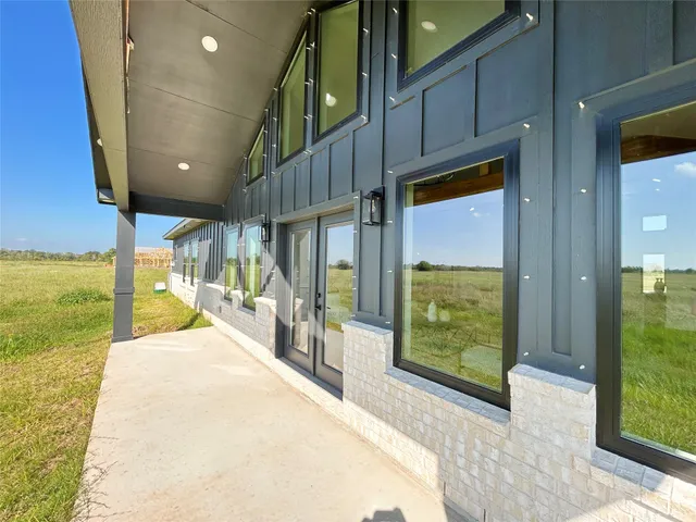 a view of a building with an outdoor space and balcony