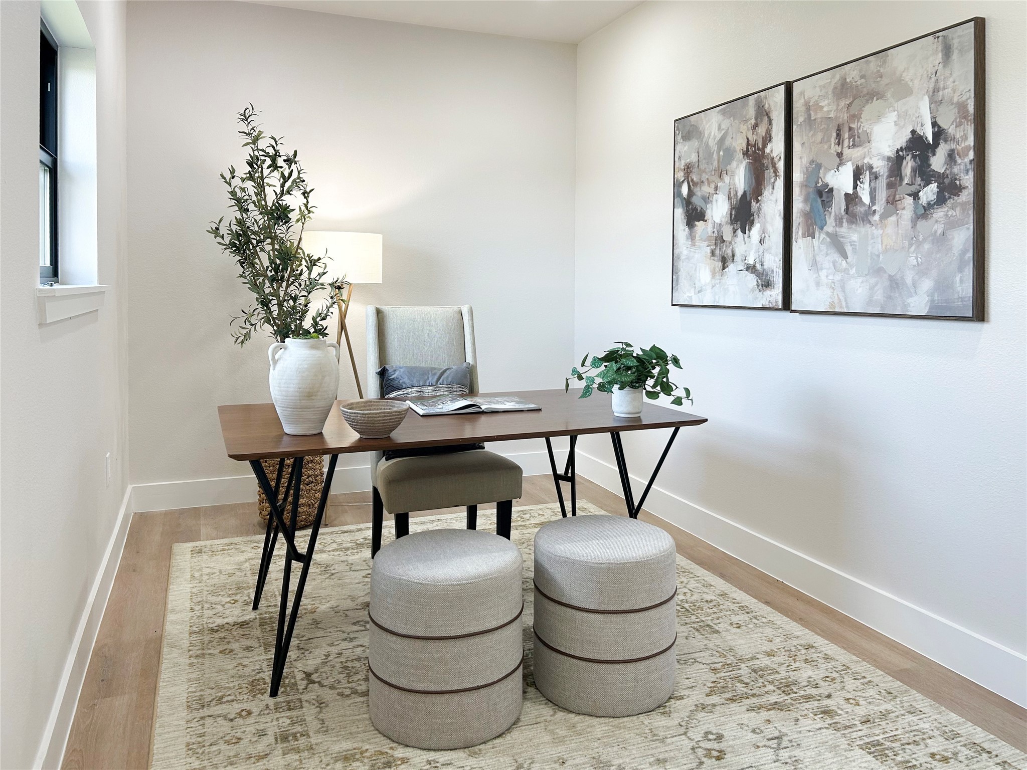619 Chuckwagon Trail Angleton, TX 77515 - Photo 5 of 35 a dining room with furniture and a potted plant
