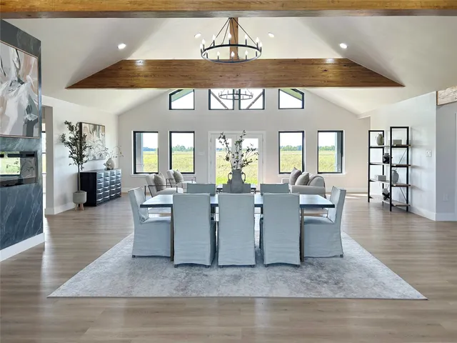 a view of a living room and dining room