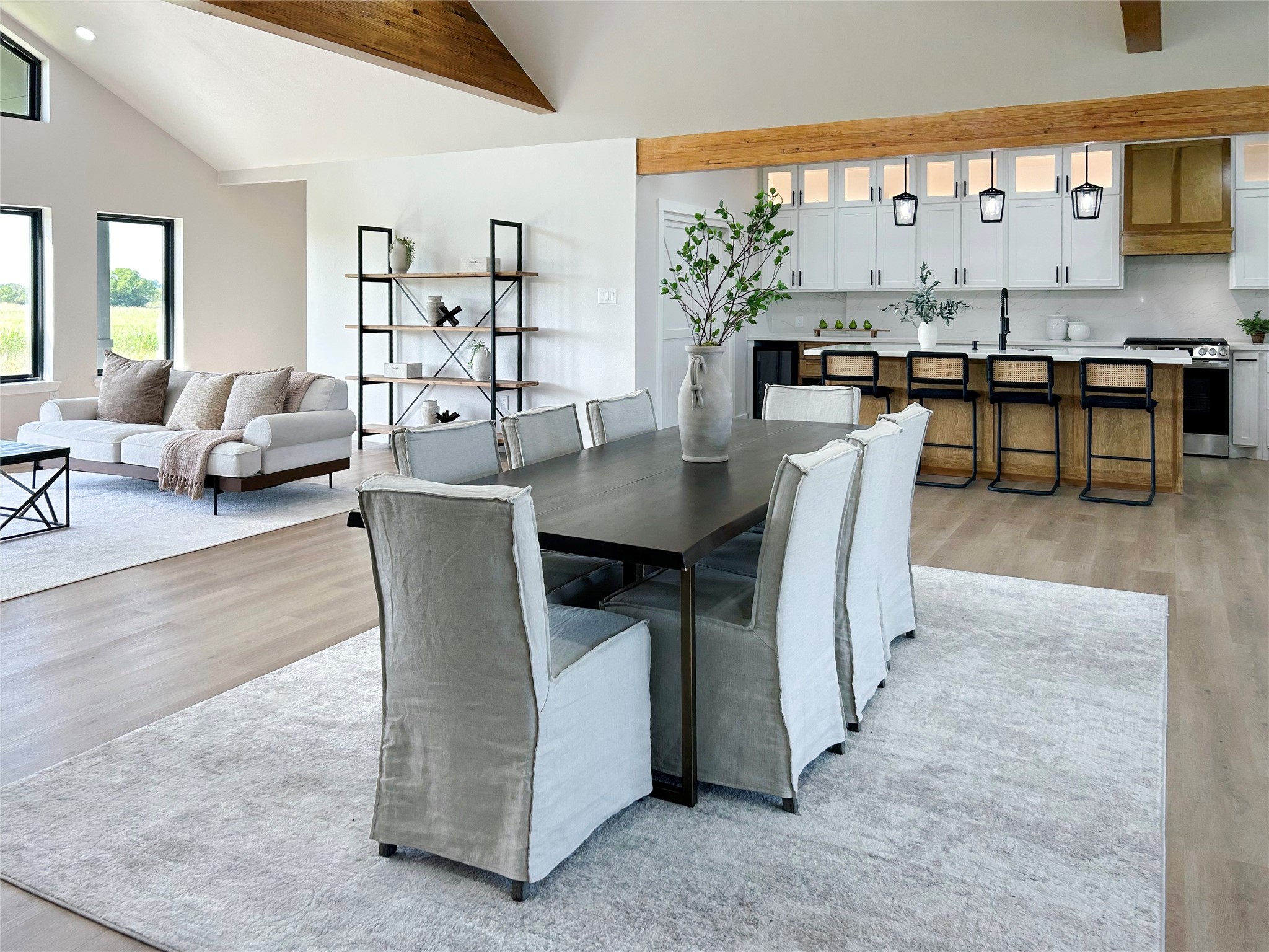 619 Chuckwagon Trail Angleton, TX 77515 - Photo 8 of 35 a view of a dining room with furniture and chandelier