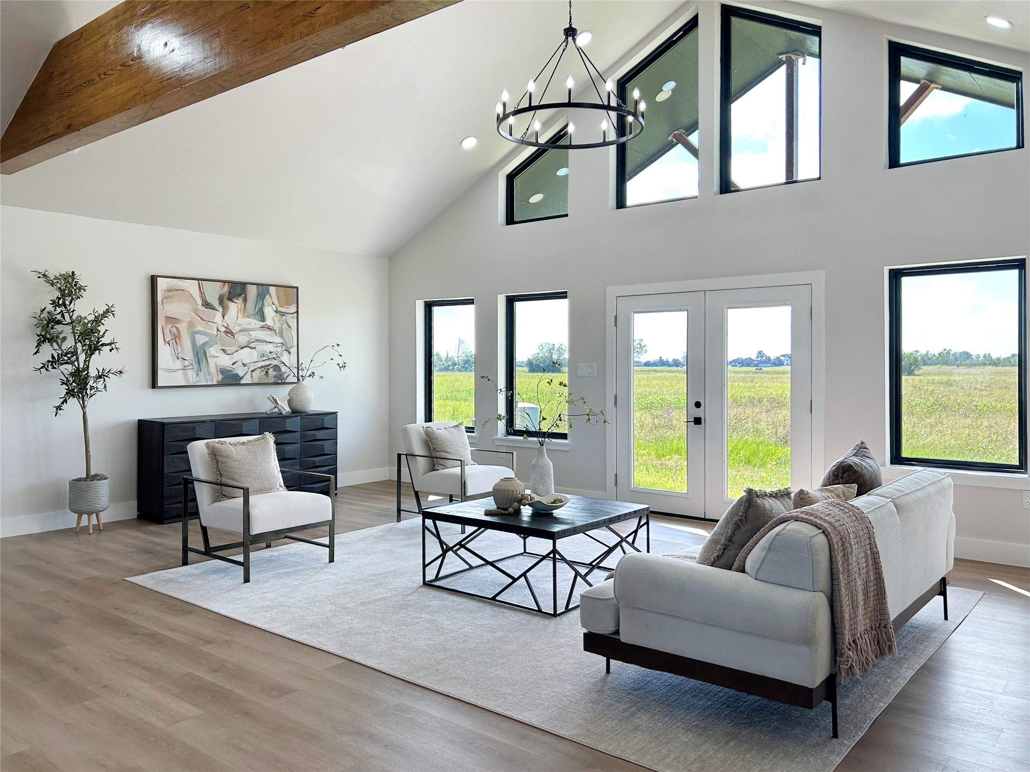 619 Chuckwagon Trail Angleton, TX 77515 - Photo 10 of 35 a living room with furniture and floor to ceiling windows