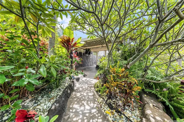 a backyard of a house with lots of green space