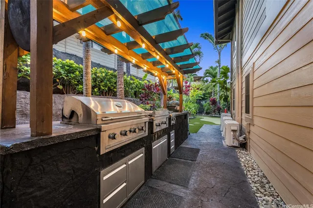 a kitchen with a stove and a microwave