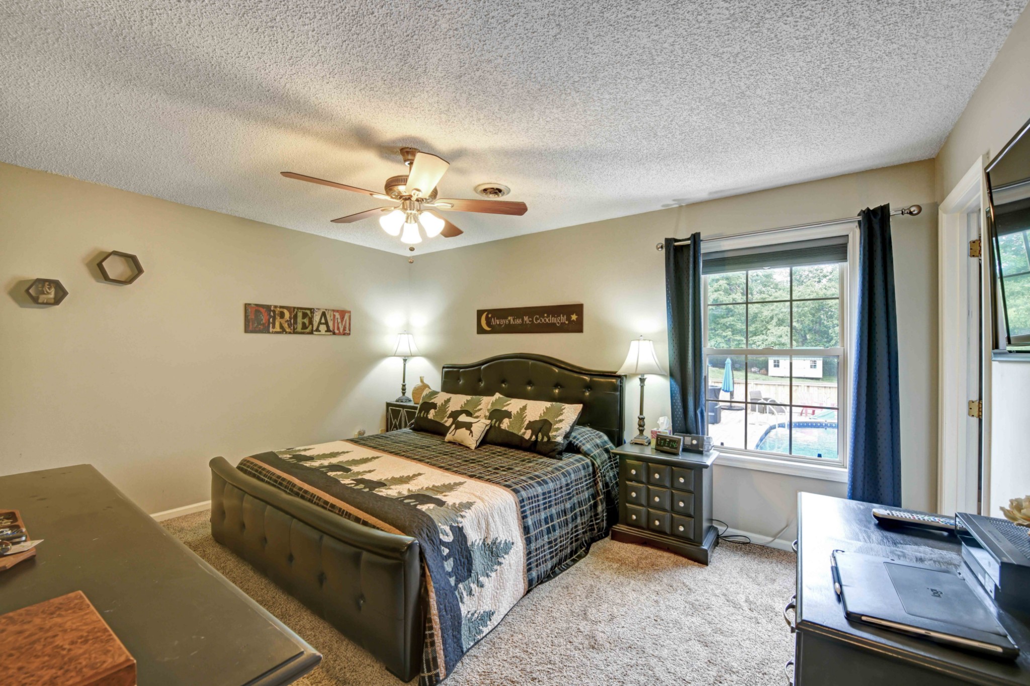 607 Vaughan's Gap Road Spring Hill, TN 37174 - Photo 15 of 34 a bedroom with a bed and a window