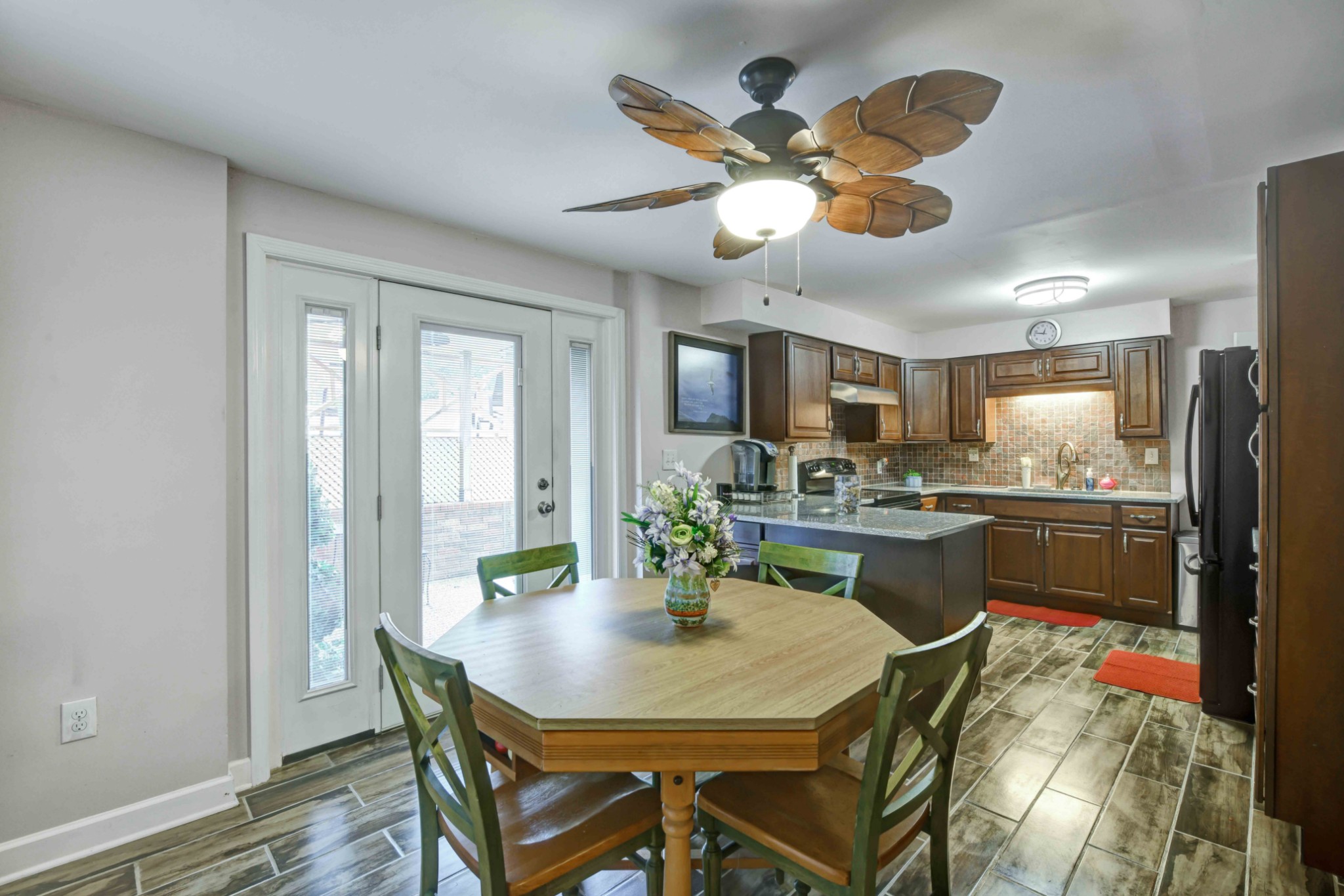 607 Vaughan's Gap Road Spring Hill, TN 37174 - Photo 21 of 34 a view of a dining room with furniture and a chandelier