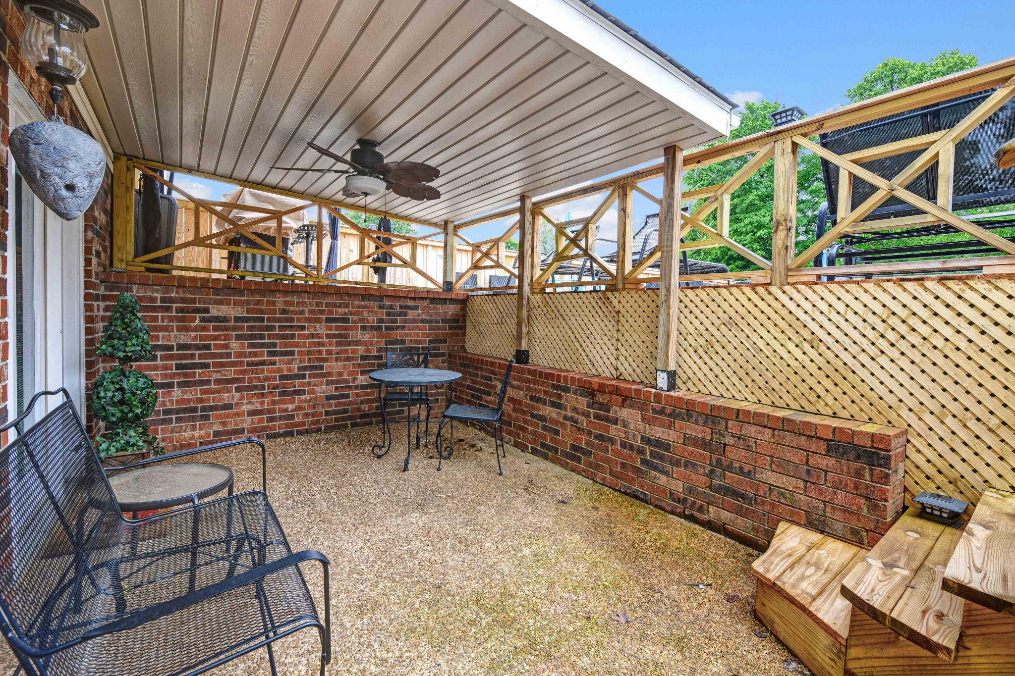 607 Vaughan's Gap Road Spring Hill, TN 37174 - Photo 24 of 34 a backyard of a house with table and chairs