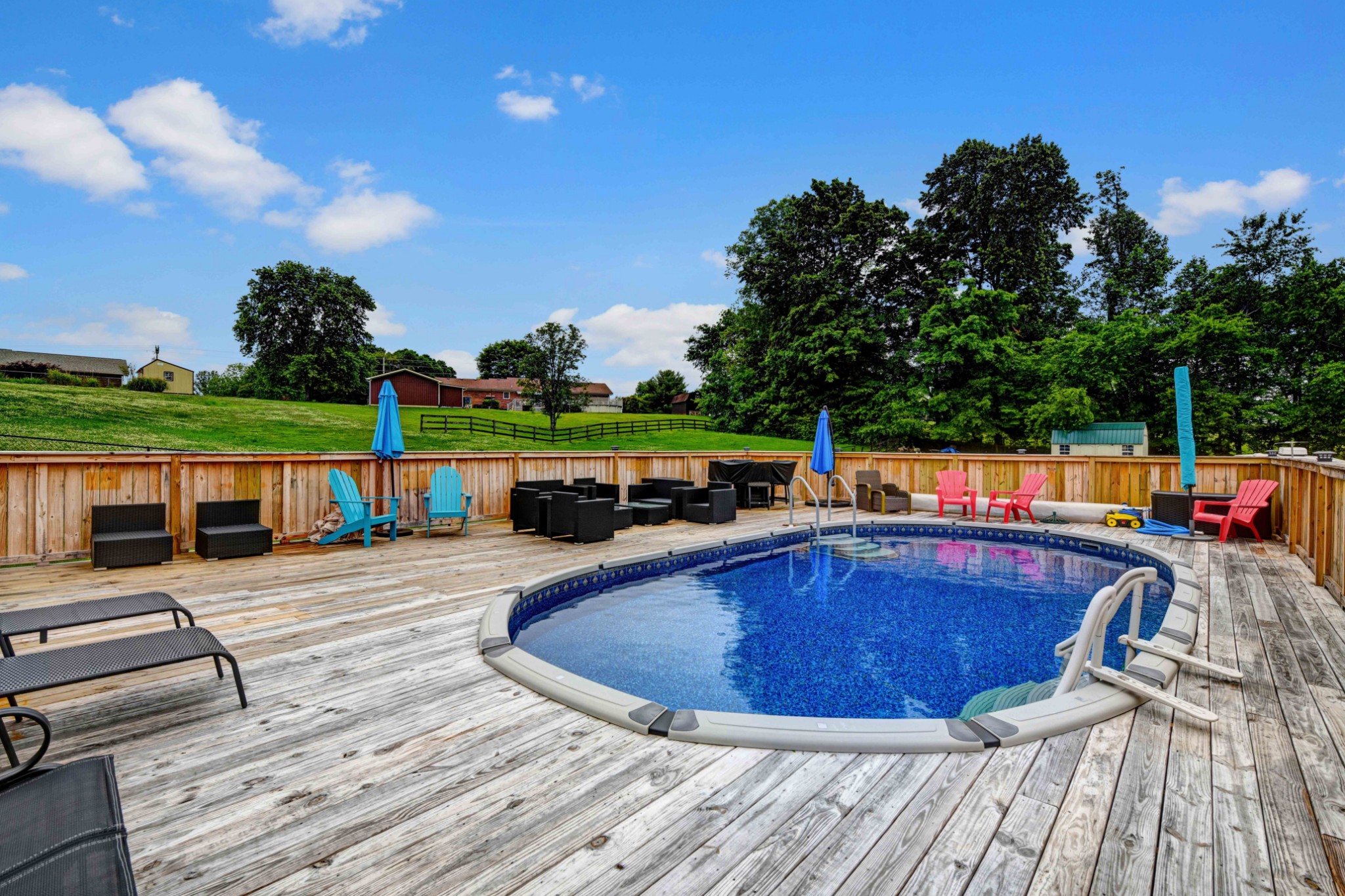 607 Vaughan's Gap Road Spring Hill, TN 37174 - Photo 25 of 34 a view of a swimming pool with a patio