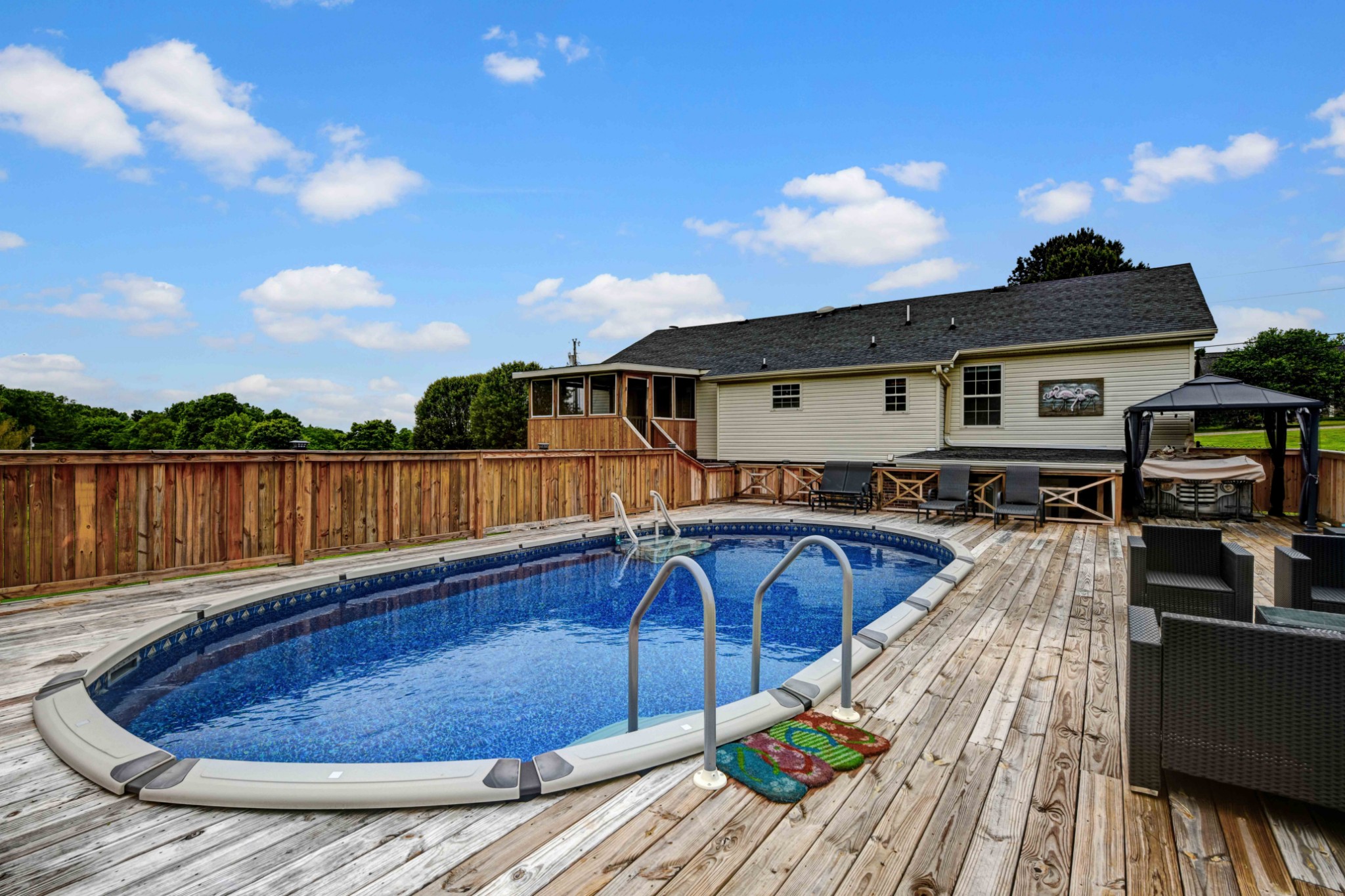 607 Vaughan's Gap Road Spring Hill, TN 37174 - Photo 26 of 34 a view of a house with swimming pool and sitting area