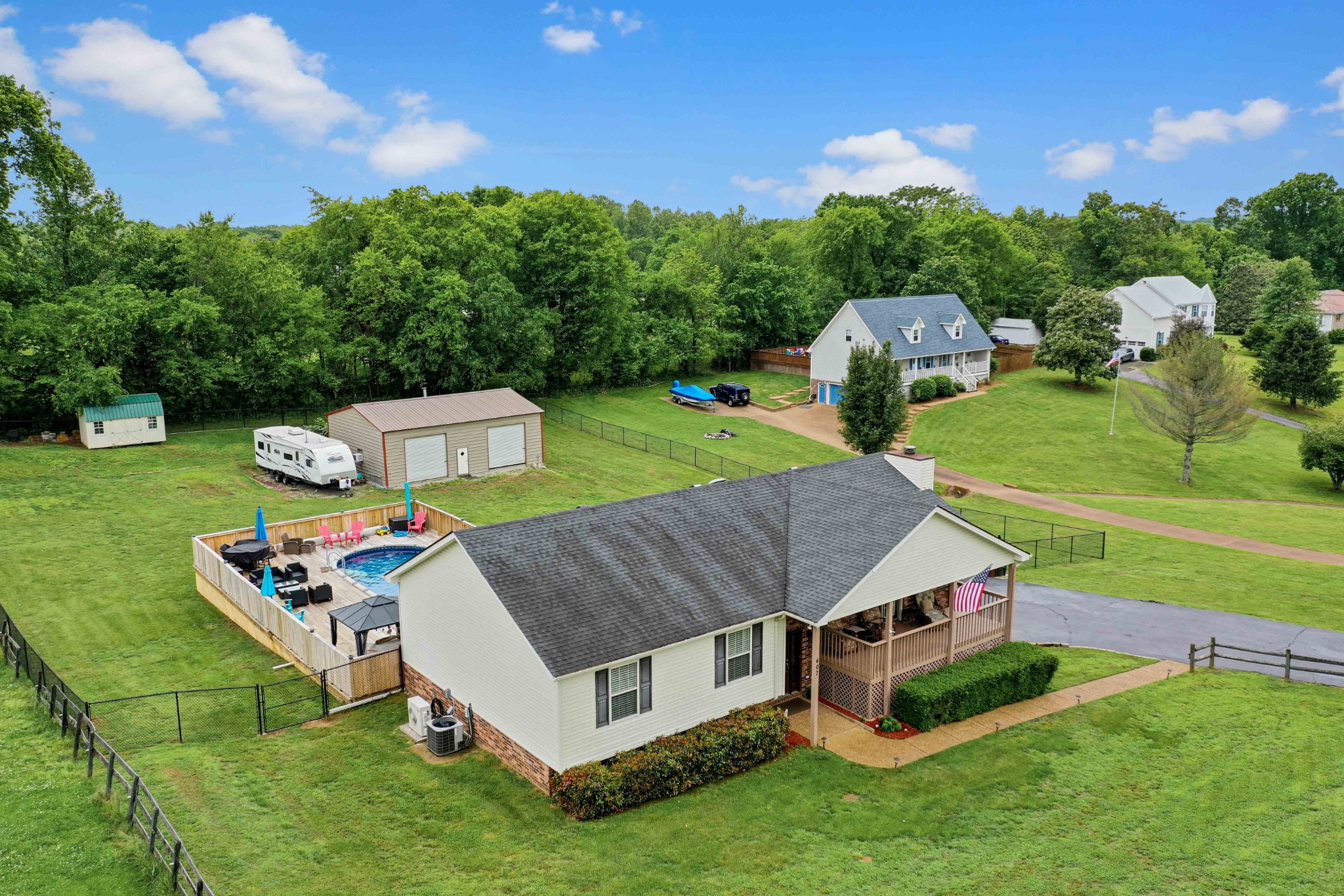 607 Vaughan's Gap Road Spring Hill, TN 37174 - Photo 4 of 34 a aerial view of a house with a yard