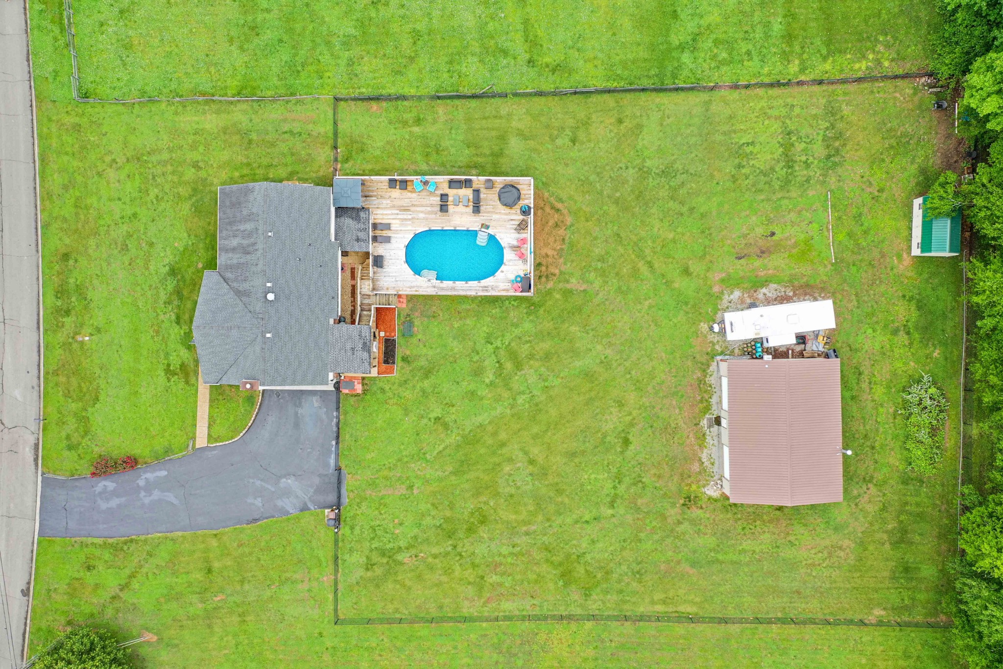 607 Vaughan's Gap Road Spring Hill, TN 37174 - Photo 31 of 34 an aerial view of a house with a garden