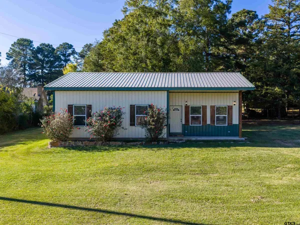 a view of a house with swimming pool