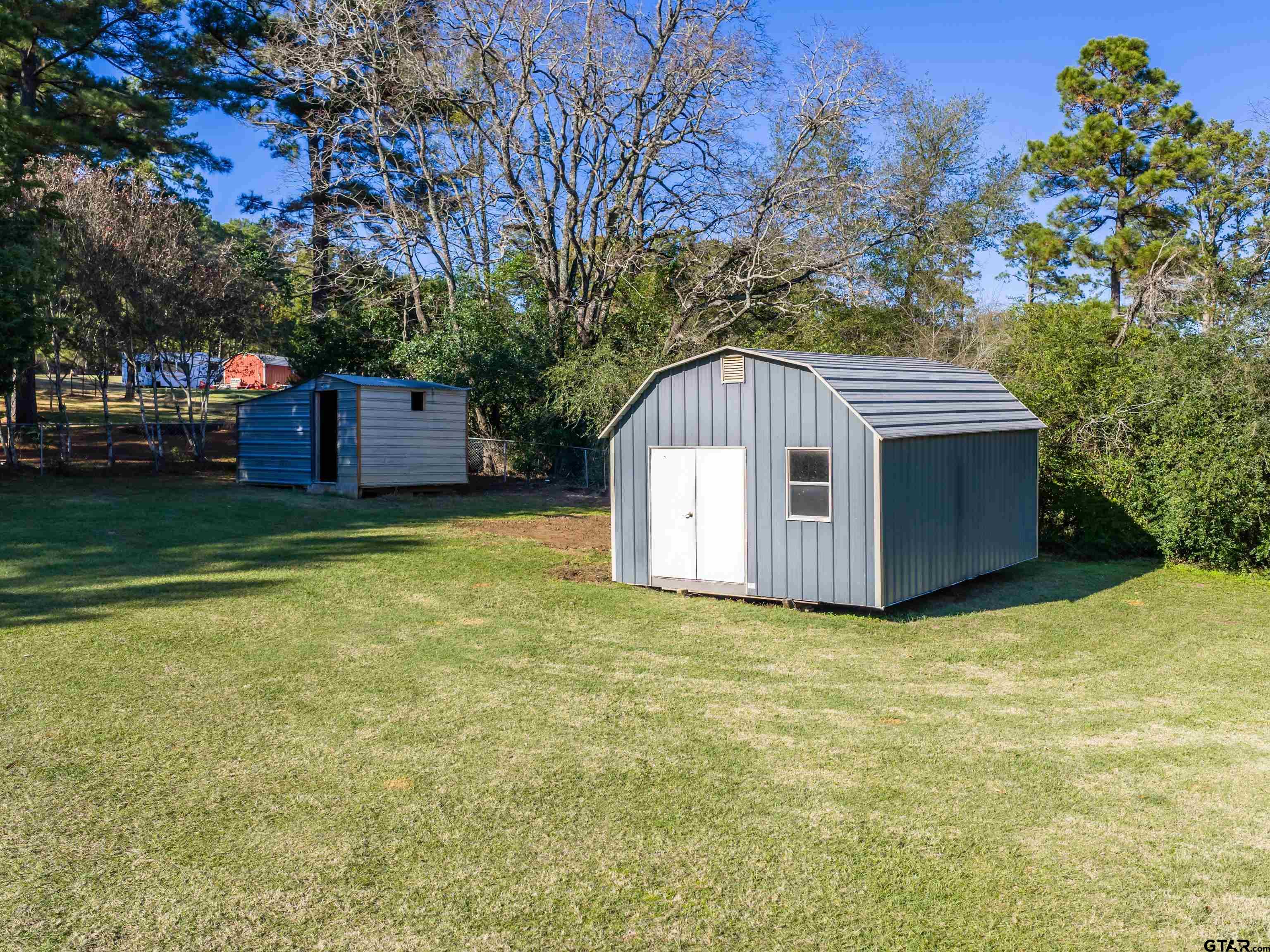 271 Front Street Palestine, TX 75803 - Photo 23 of 25 a view of a big house with a yard and large trees