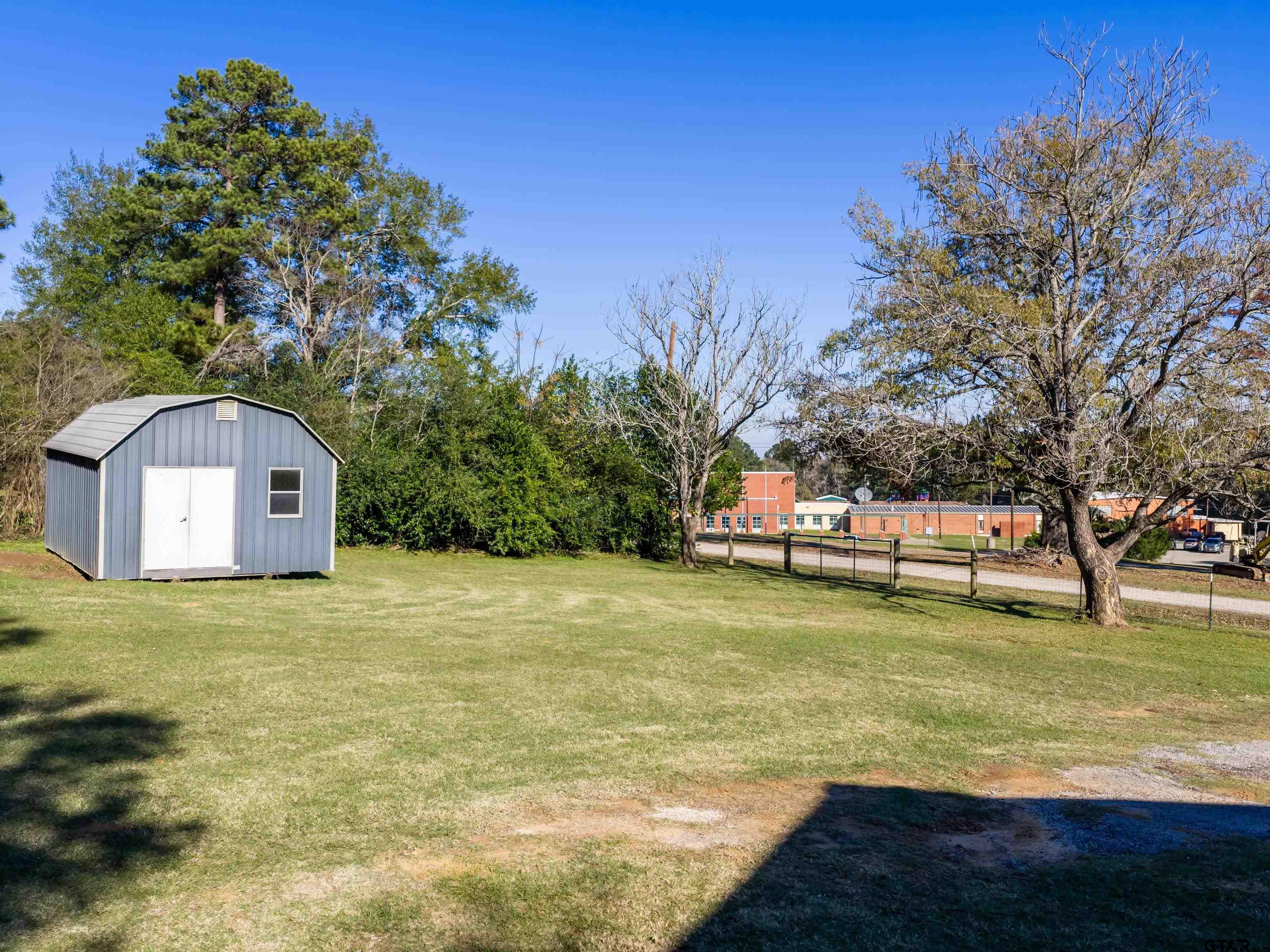 271 Front Street Palestine, TX 75803 - Photo 24 of 25 a house with swimming pool in front of it