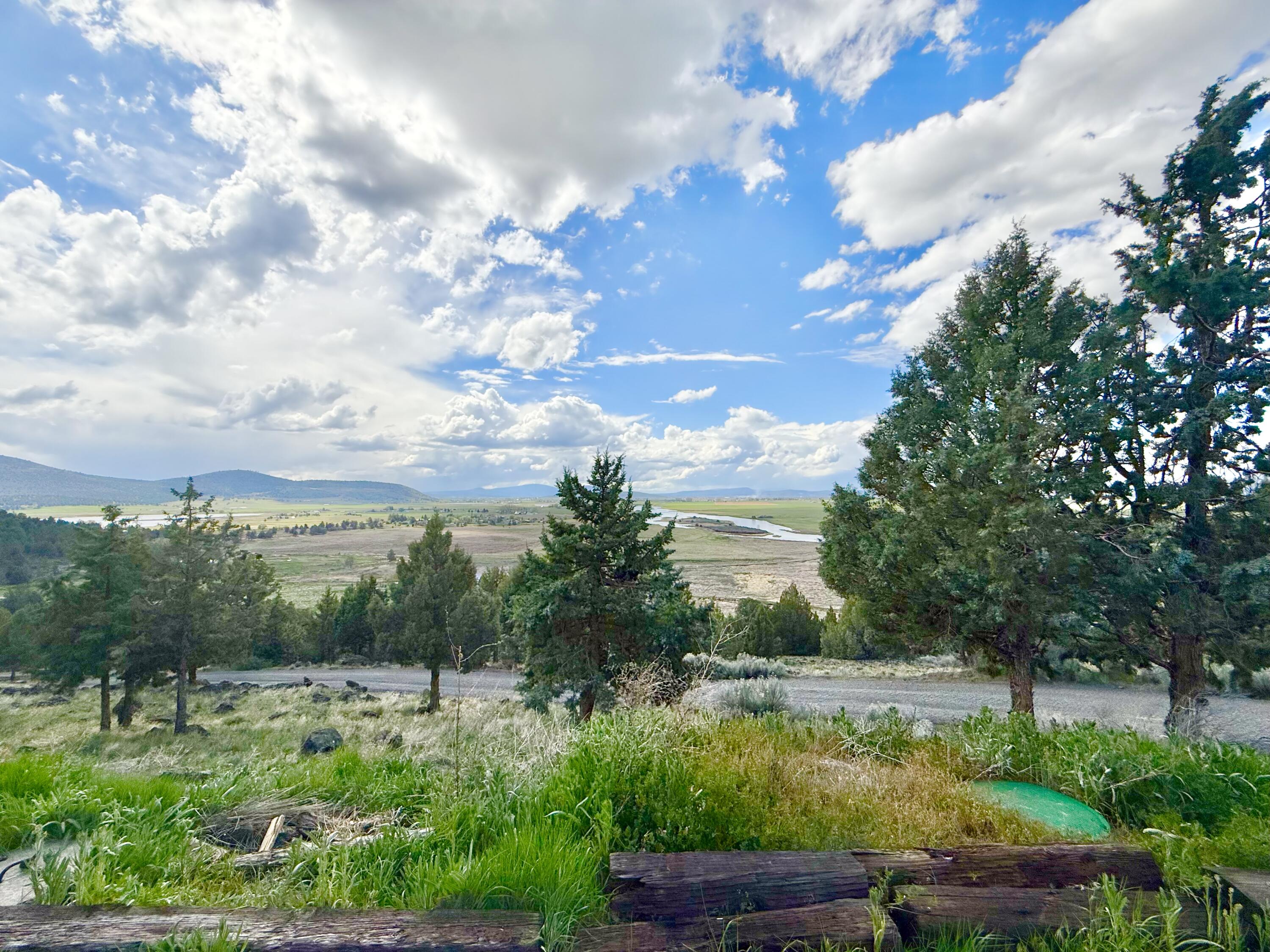 13351 Crystal Springs Road Klamath Falls, OR 97603 - Photo 13 of 51 a view of a lake with houses in the back