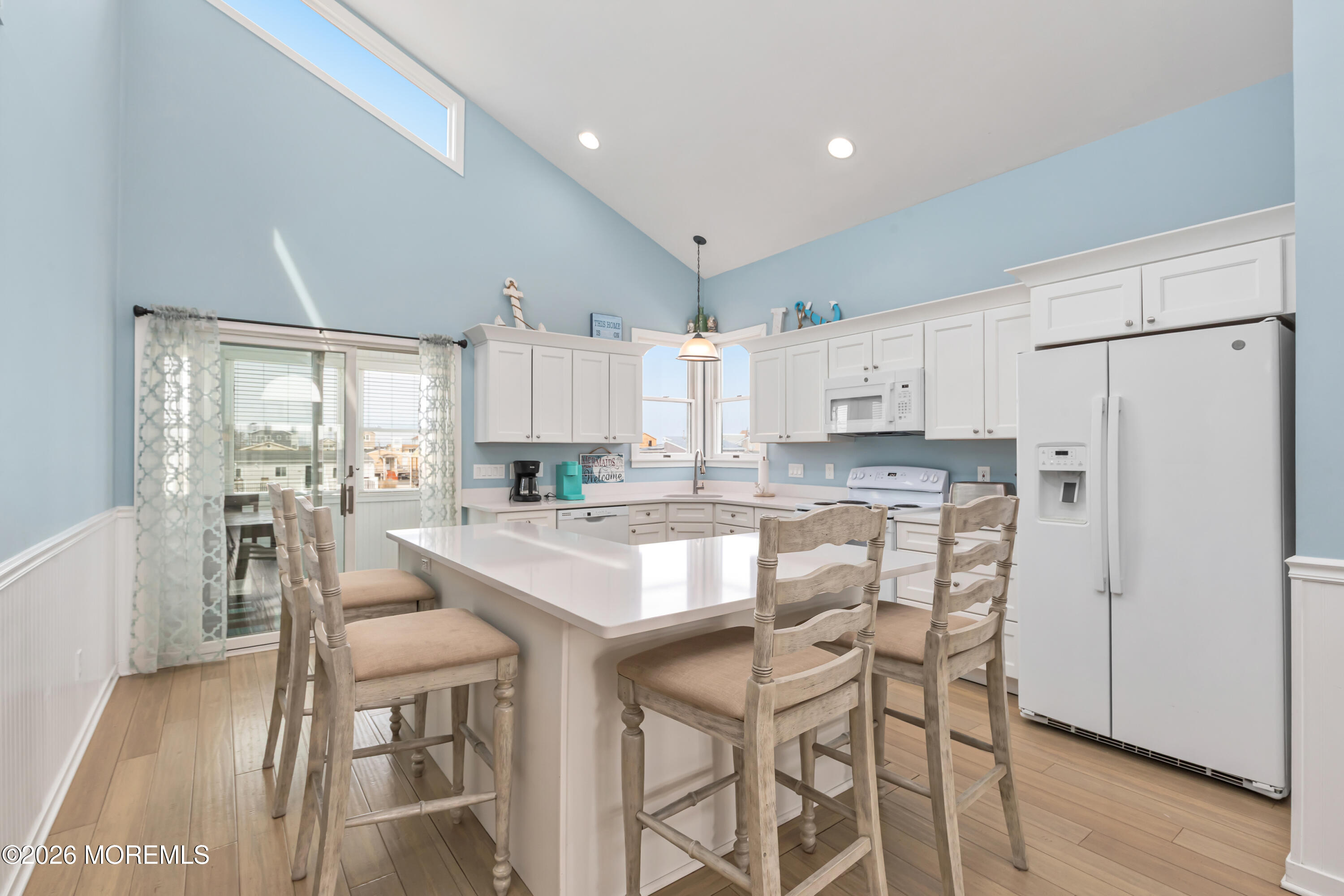 170 Flamingo Road Tuckerton, NJ 08087 - Photo 14 of 41 a kitchen with stainless steel appliances granite countertop a refrigerator a stove a sink a dining table and chairs