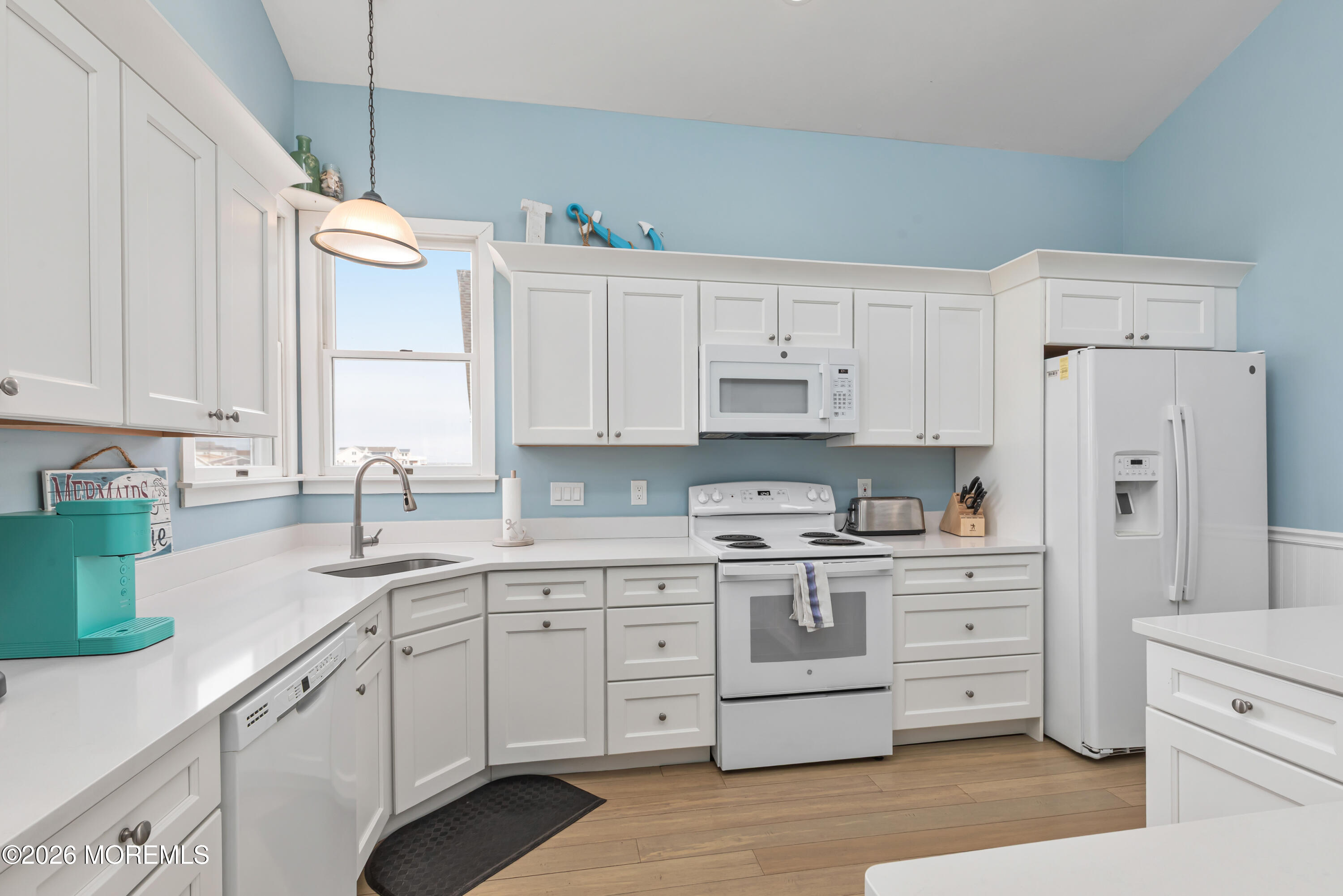 170 Flamingo Road Tuckerton, NJ 08087 - Photo 16 of 41 a kitchen with cabinets appliances a sink and a counter top