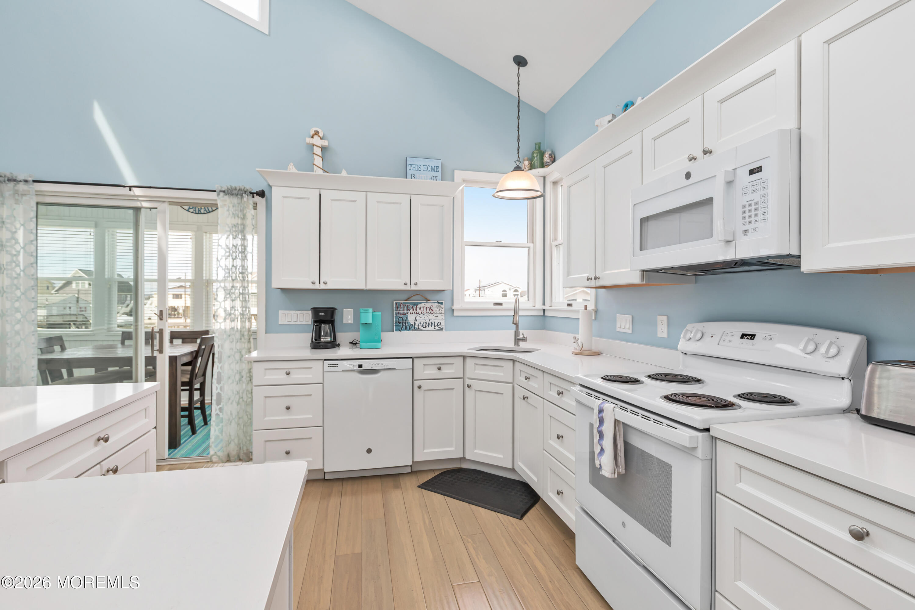 170 Flamingo Road Tuckerton, NJ 08087 - Photo 18 of 41 a kitchen with cabinets appliances a sink and a window