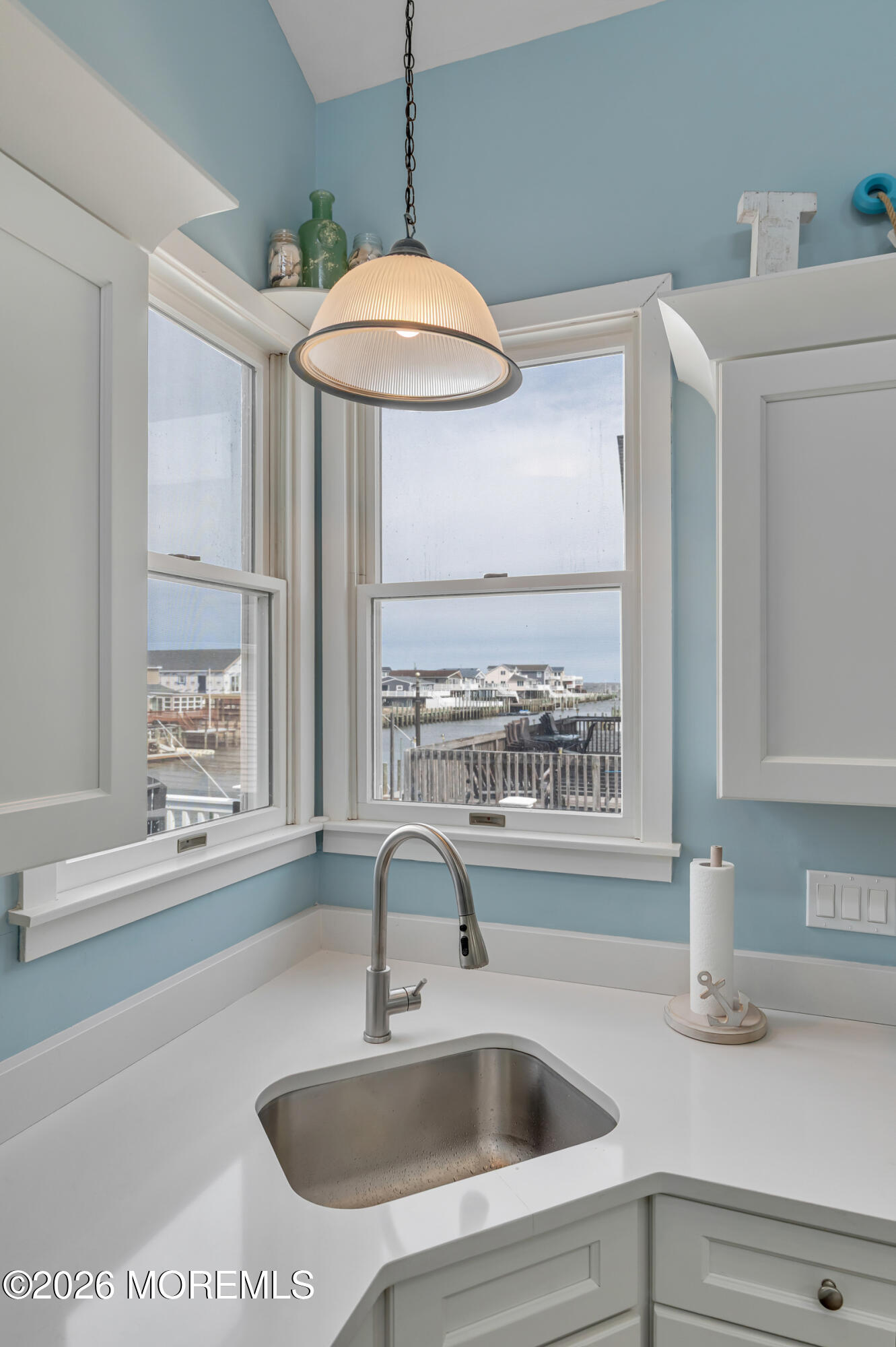 170 Flamingo Road Tuckerton, NJ 08087 - Photo 19 of 41 a kitchen with a sink a counter top and a stove