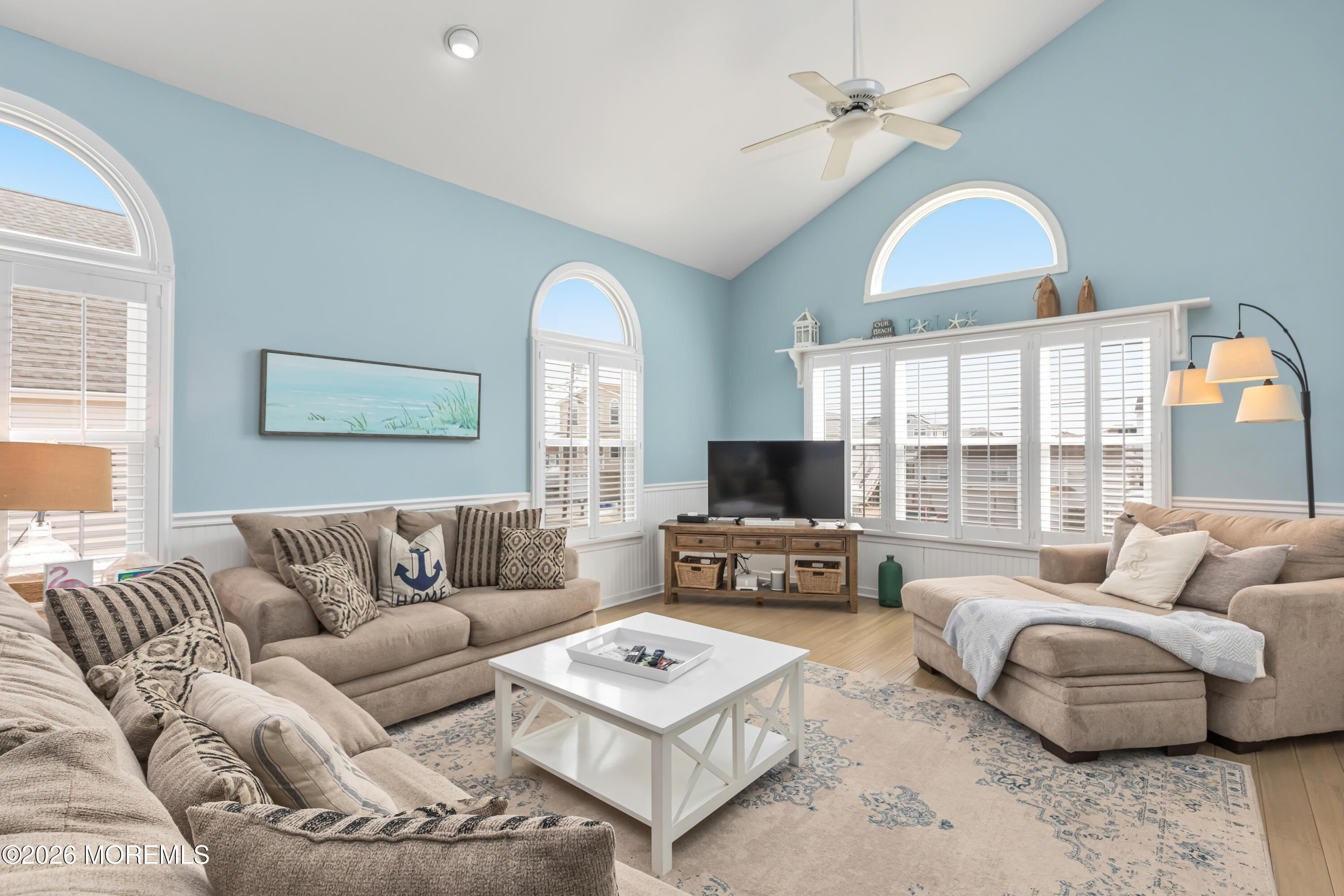 170 Flamingo Road Tuckerton, NJ 08087 - Photo 9 of 41 a living room with furniture a flat screen tv and a large window