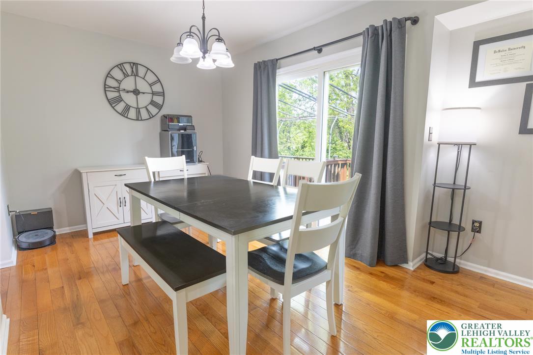 896 Briarstone Road Bethlehem, PA 18017 - Photo 8 of 26 a view of a dining room with furniture window and wooden floor