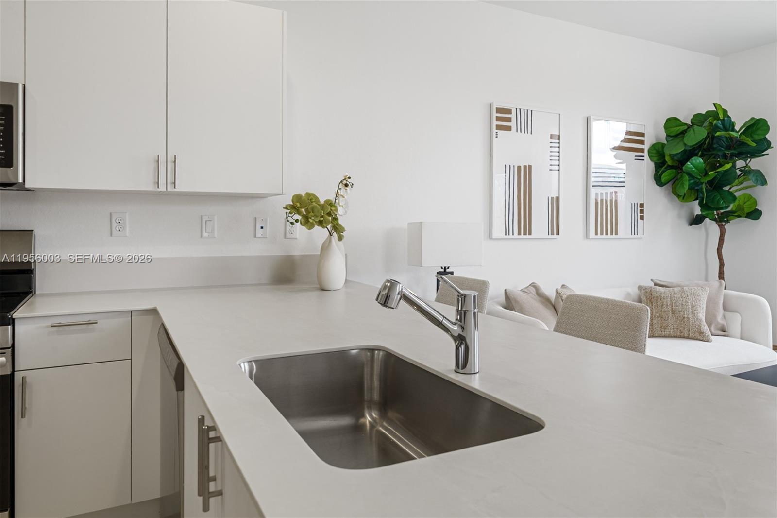19448 Southwest 338th Terrace Homestead, FL 33034 - Photo 11 of 44 a kitchen with a sink and cabinets