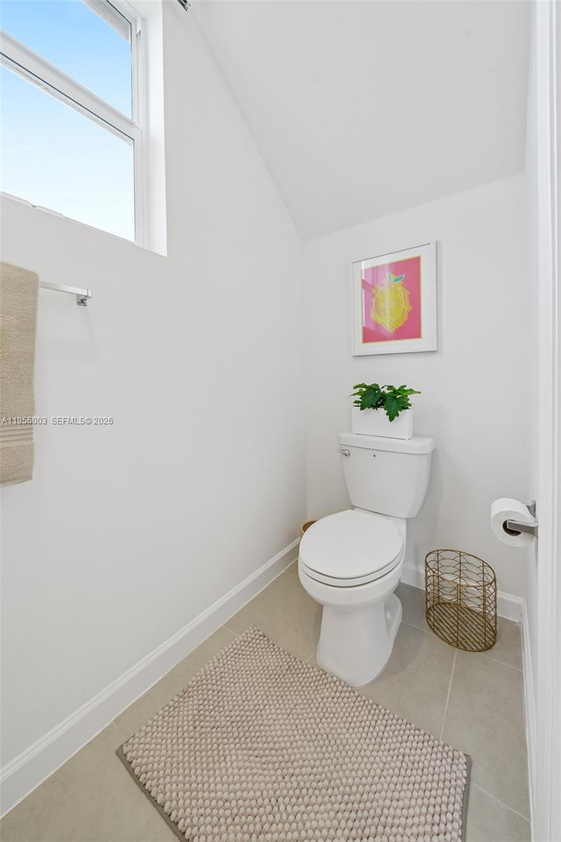 19448 Southwest 338th Terrace Homestead, FL 33034 - Photo 20 of 44 a bathroom with a toilet and a sink