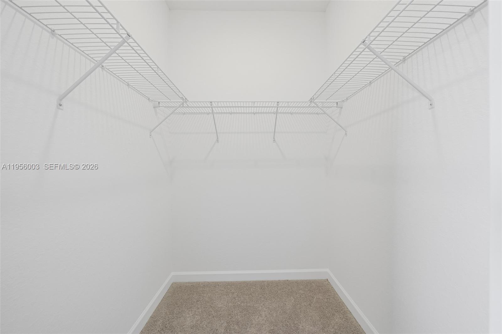 19448 Southwest 338th Terrace Homestead, FL 33034 - Photo 28 of 44 a view of a room with racks on the wall