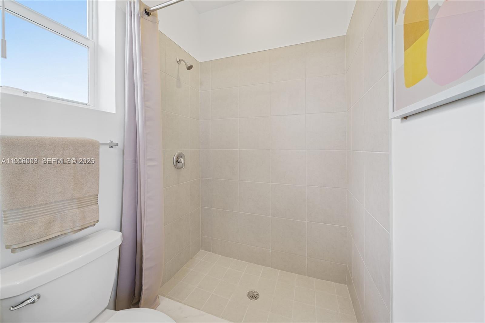 19448 Southwest 338th Terrace Homestead, FL 33034 - Photo 32 of 44 a bathroom with a bathtub and a shower