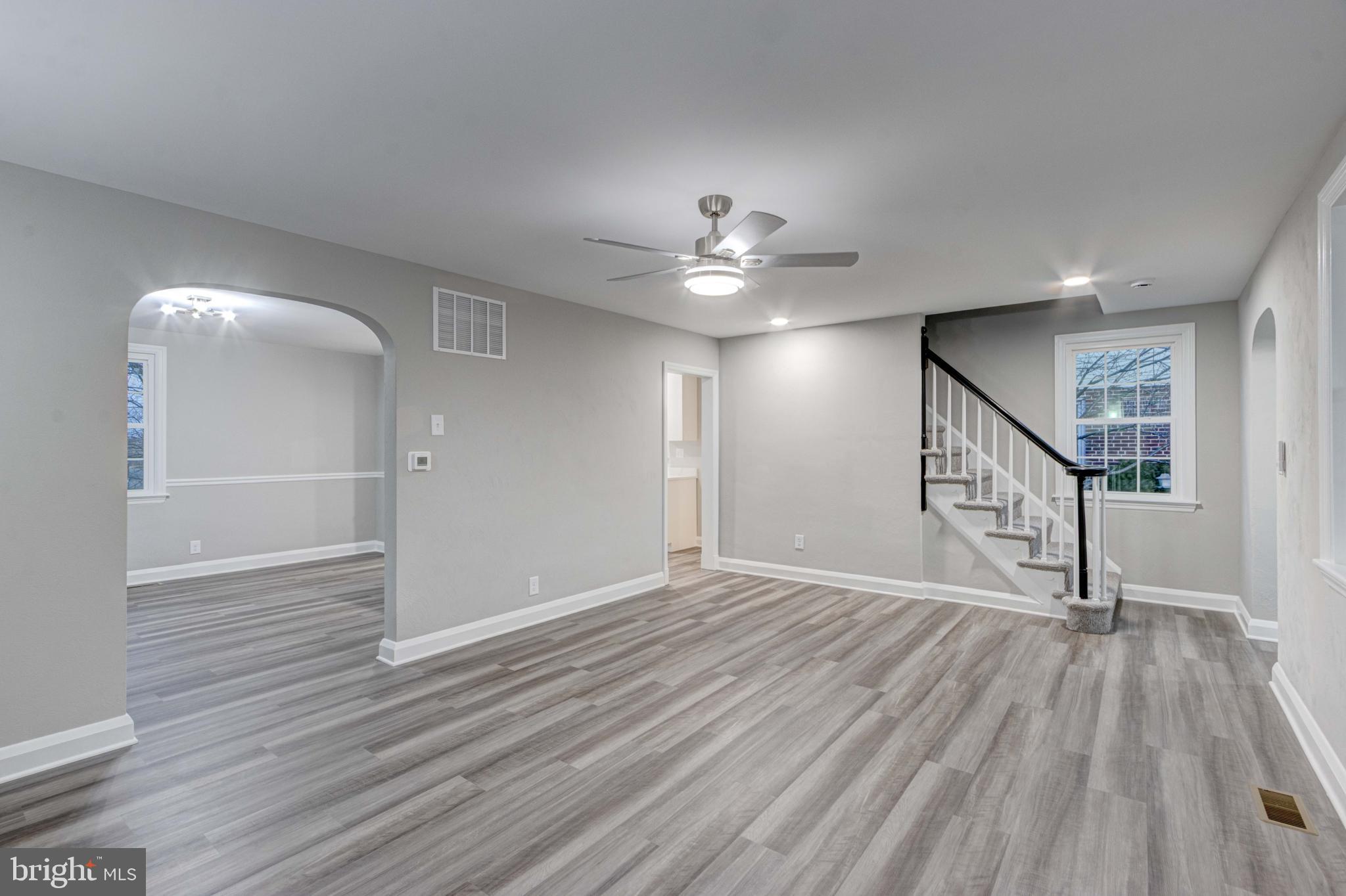 1202 Circle Drive Halethorpe, MD 21227 - Photo 13 of 36 wooden floor in an empty room with a window